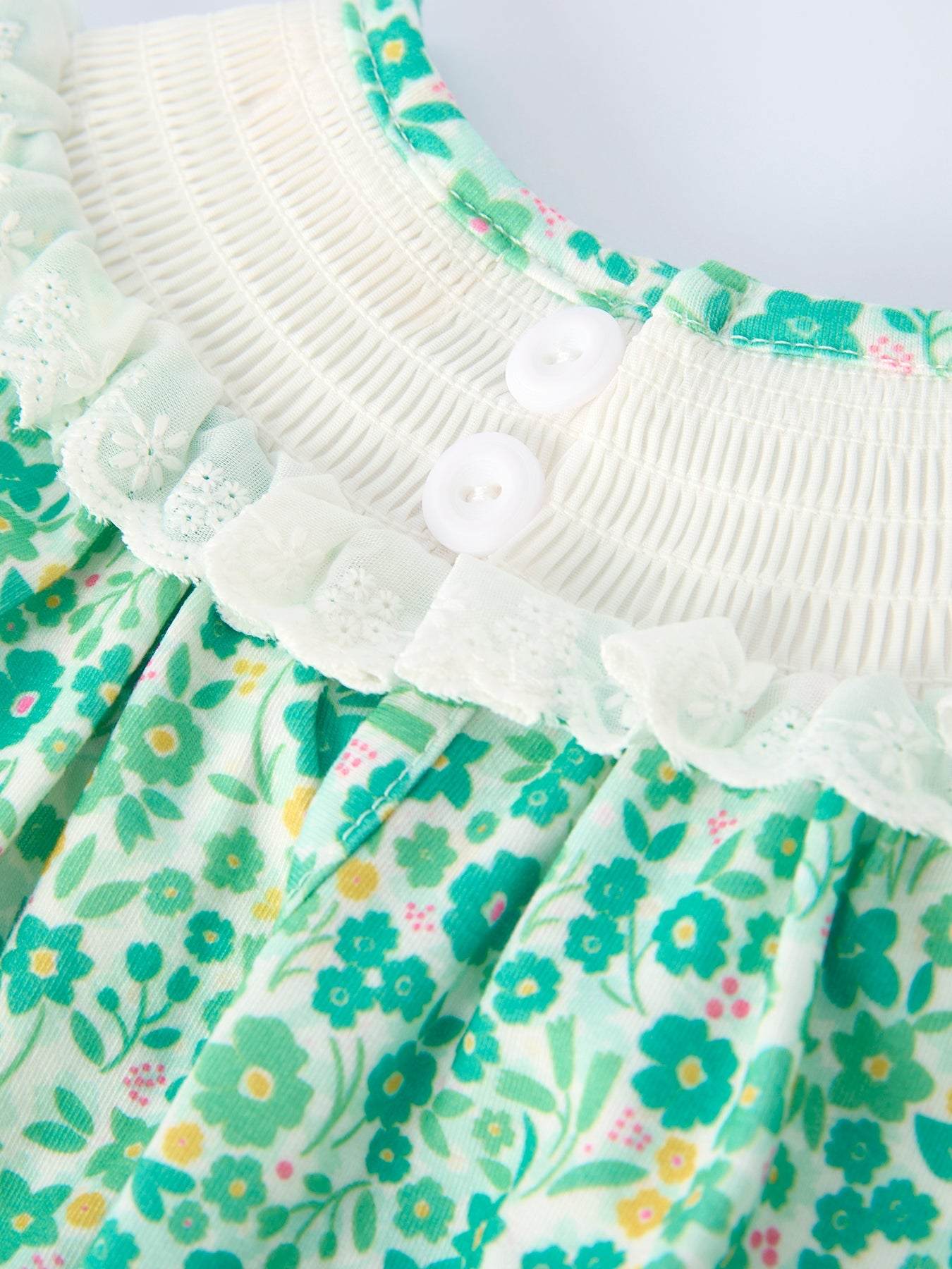 St. Patrick’s Day Shamrock Bow Smocked Baby Girl Romper
