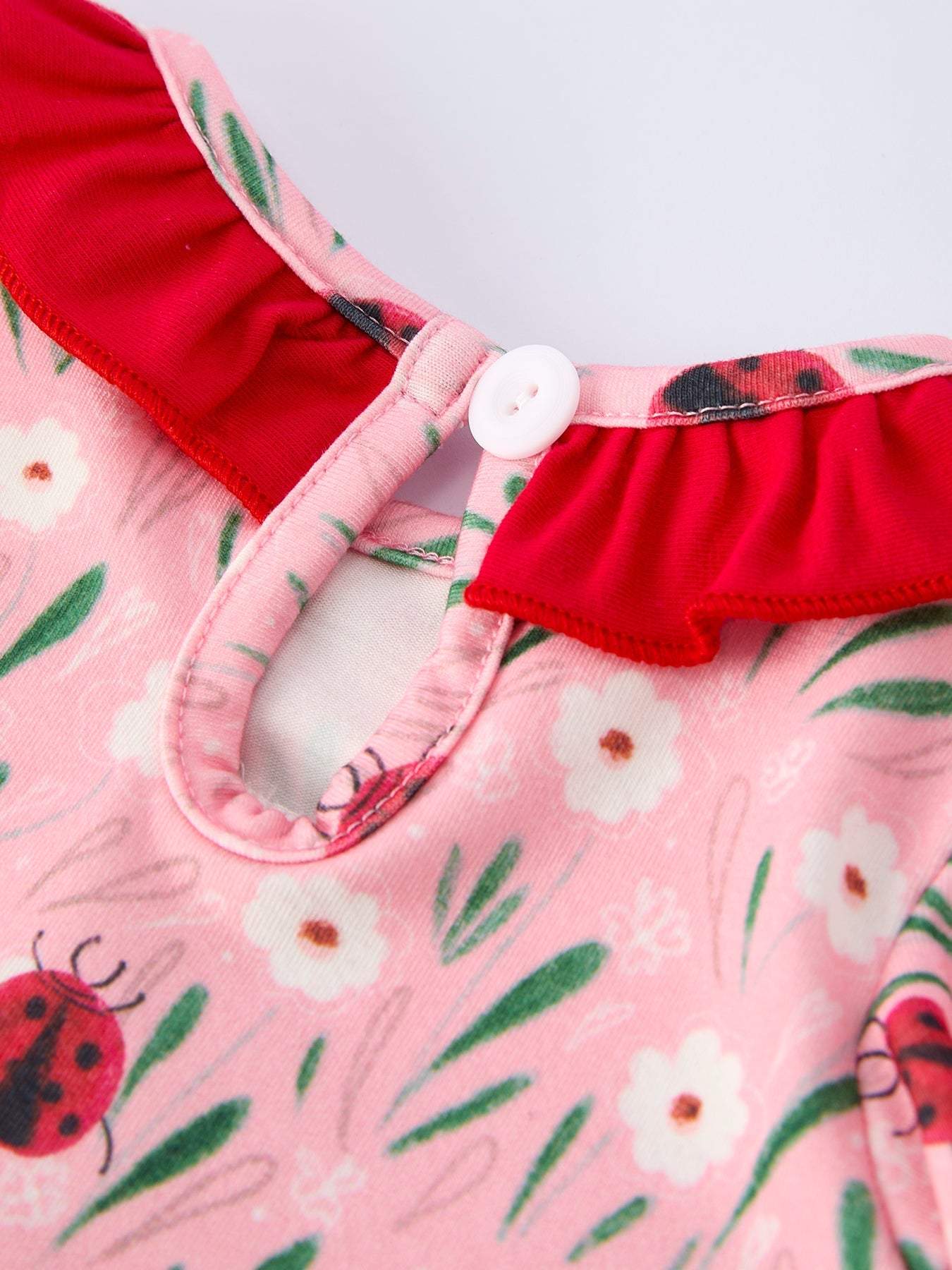 Spring ladybug smocked baby girls romper full view