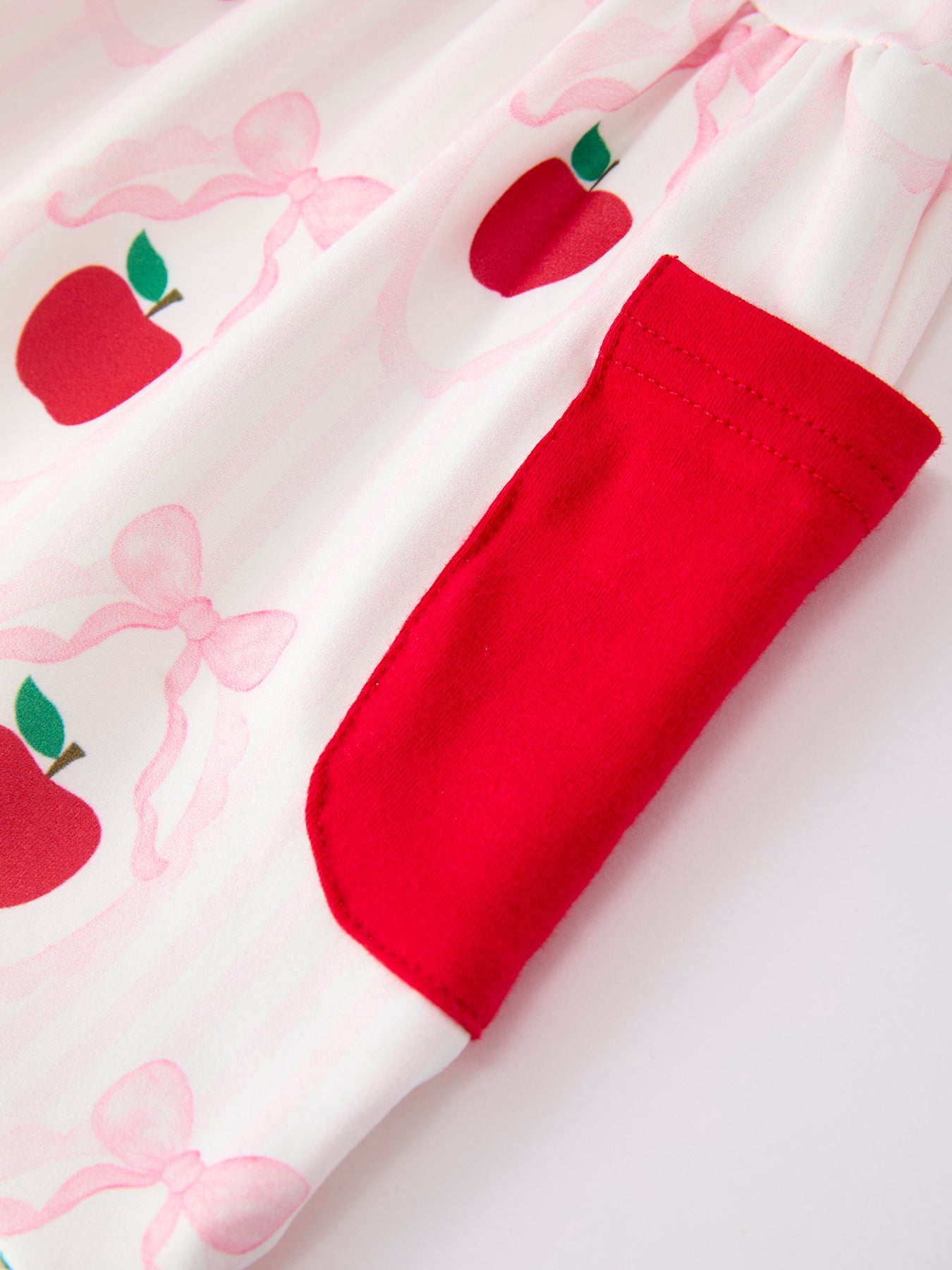Girls Back To School Apple Bow Pocket Ruffle Top Shorts Set Outfit - fabric and material close-up