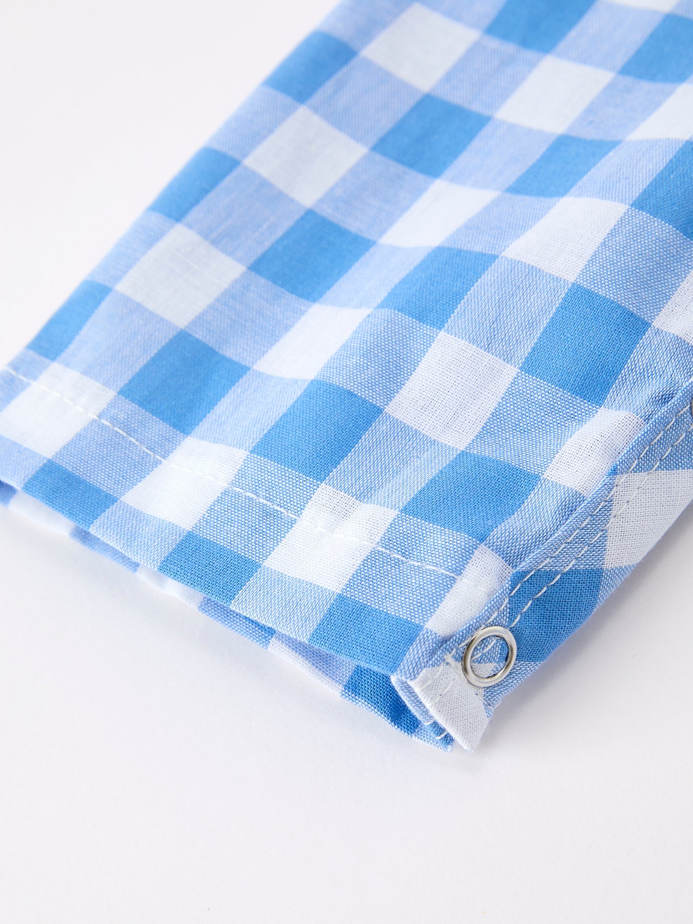 Plaid whale embroidery close-up
