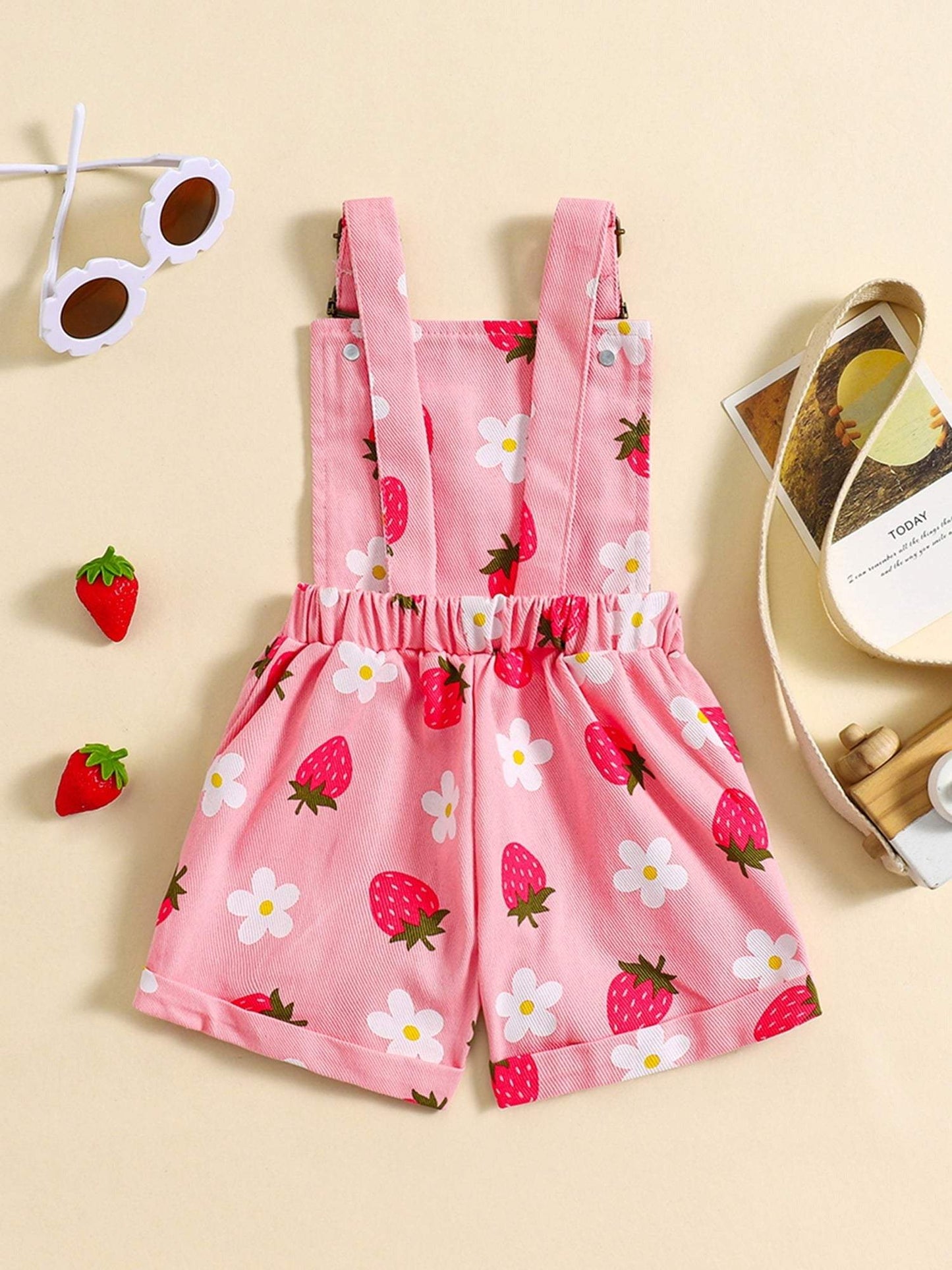 Strawberry print denim overalls for girls with daisies.