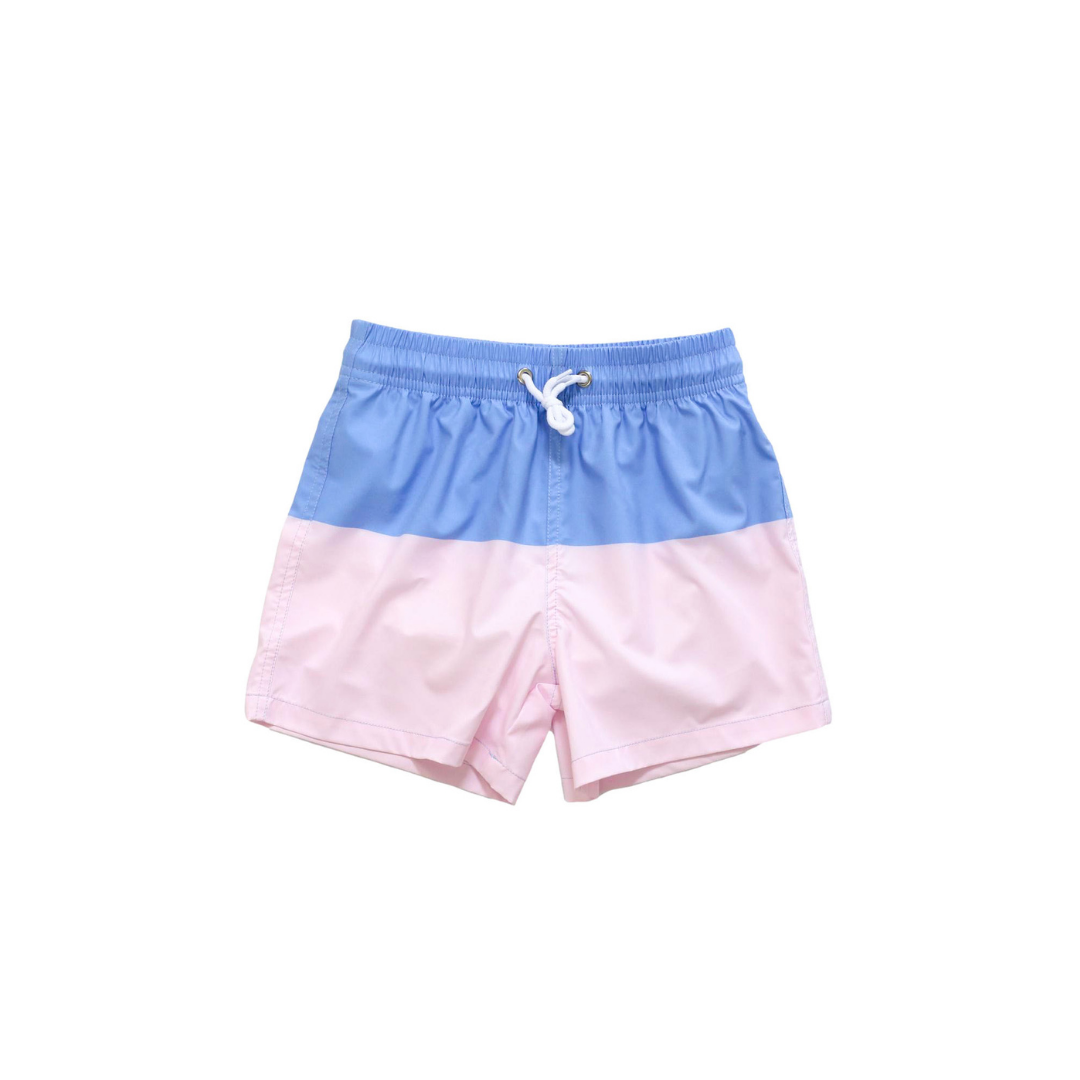Coastal Cabana Trunks with blue and pink color block design, elastic waist, and contrast drawstring.