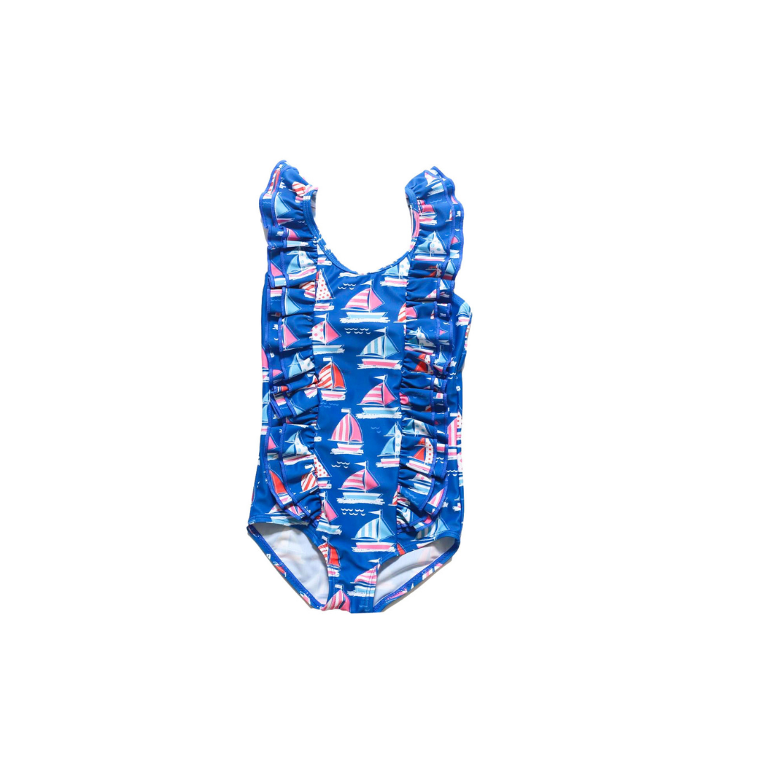 Fair Winds One Piece Swimsuit with nautical print, cascading ruffles, and back bow detail.