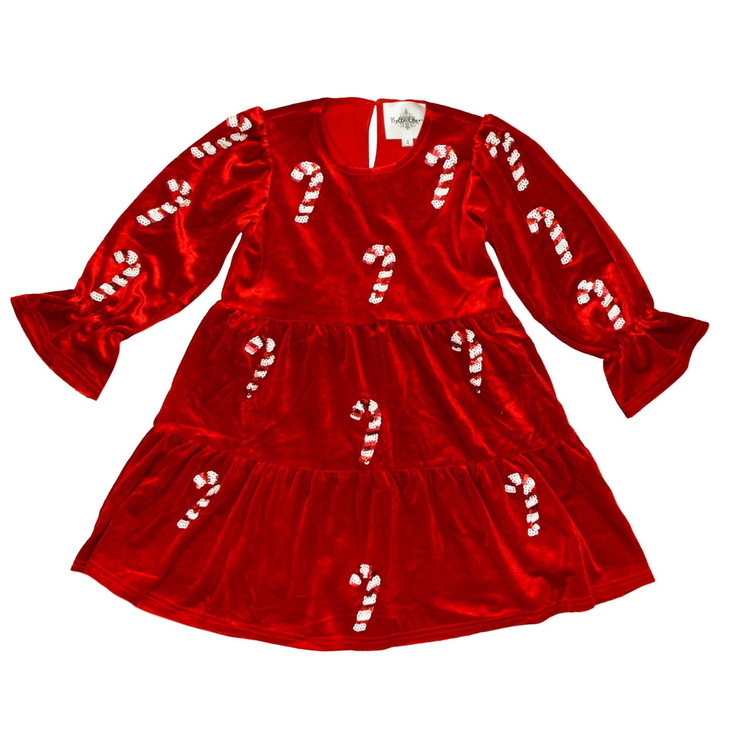 Red velvet dress with candy cane patterns on a white background
