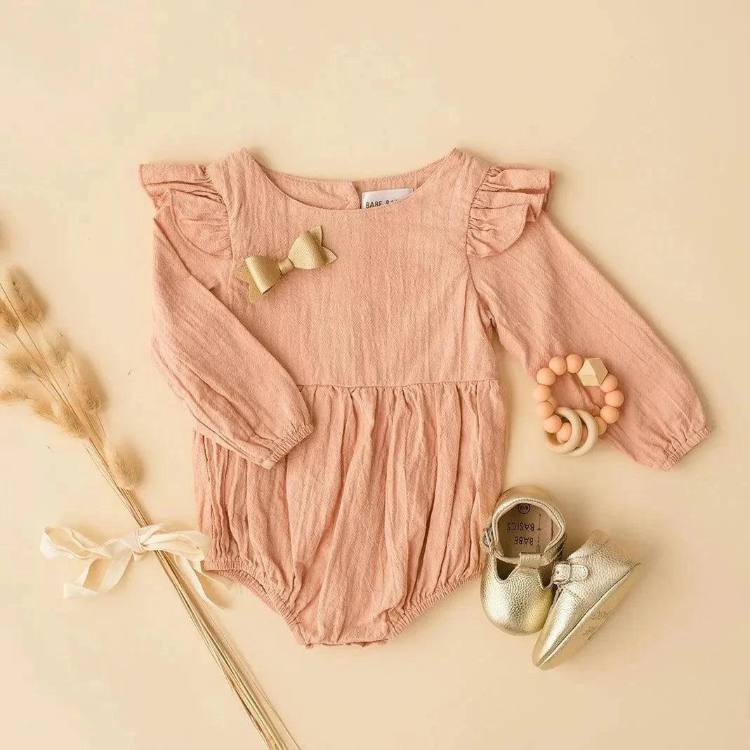 Blush Flutter Sleeve Linen Baby Romper fabric and material close-up