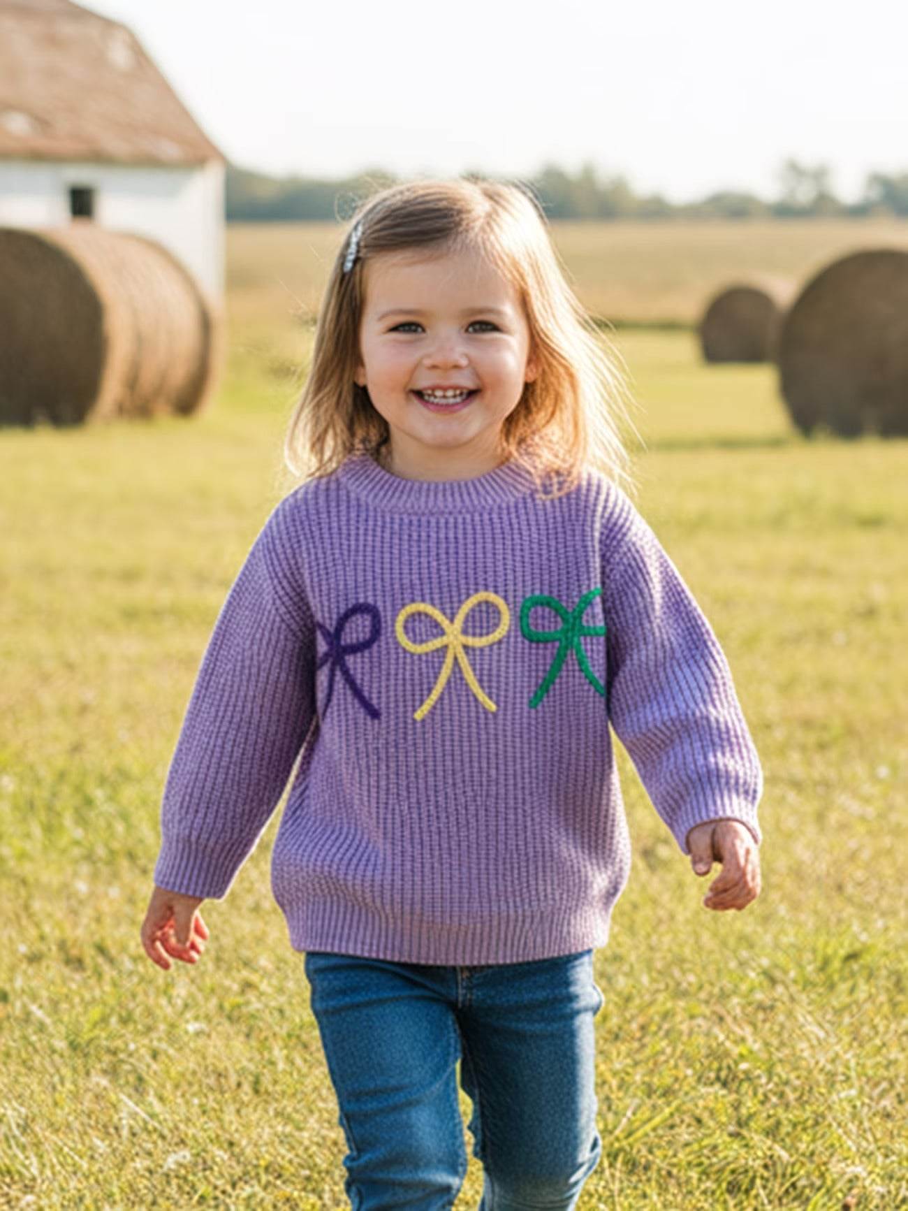 Girls' Bow Mardi Gras Sweater fabric and material close-up