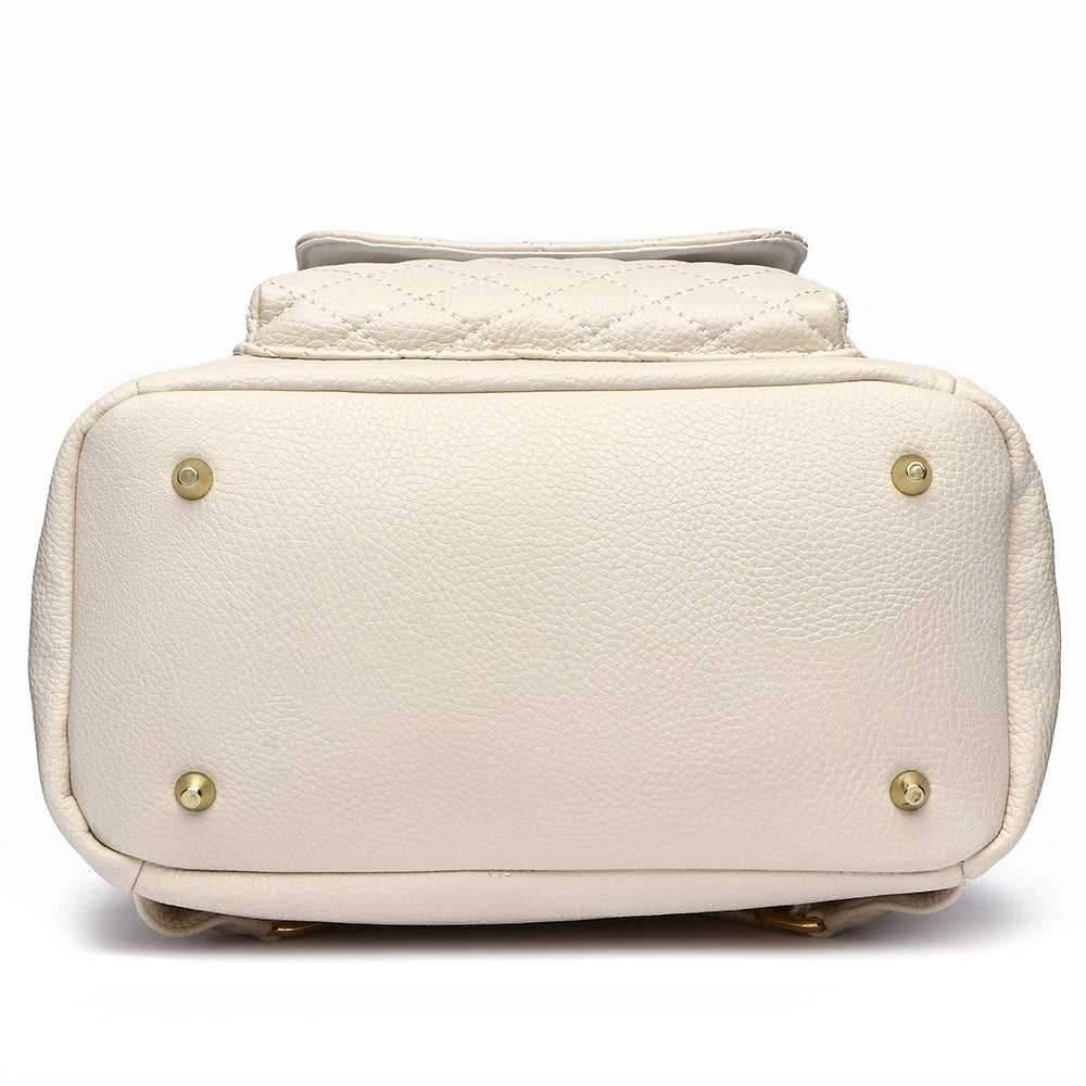 Petit Monaco Diaper Bag in pearl white with gold-tone studs, vegan leather, luxurious and compact design.