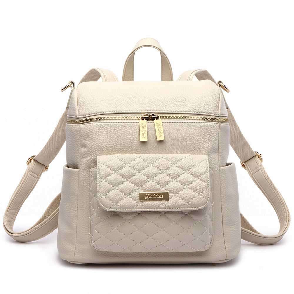 Petit Monaco Diaper Bag in pearl white vegan leather with satin lining, compact and stylish for minimalist moms.
