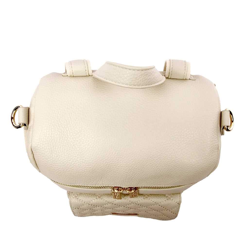 Petit Monaco Diaper Bag in pearl white, vegan leather, mini backpack style.
