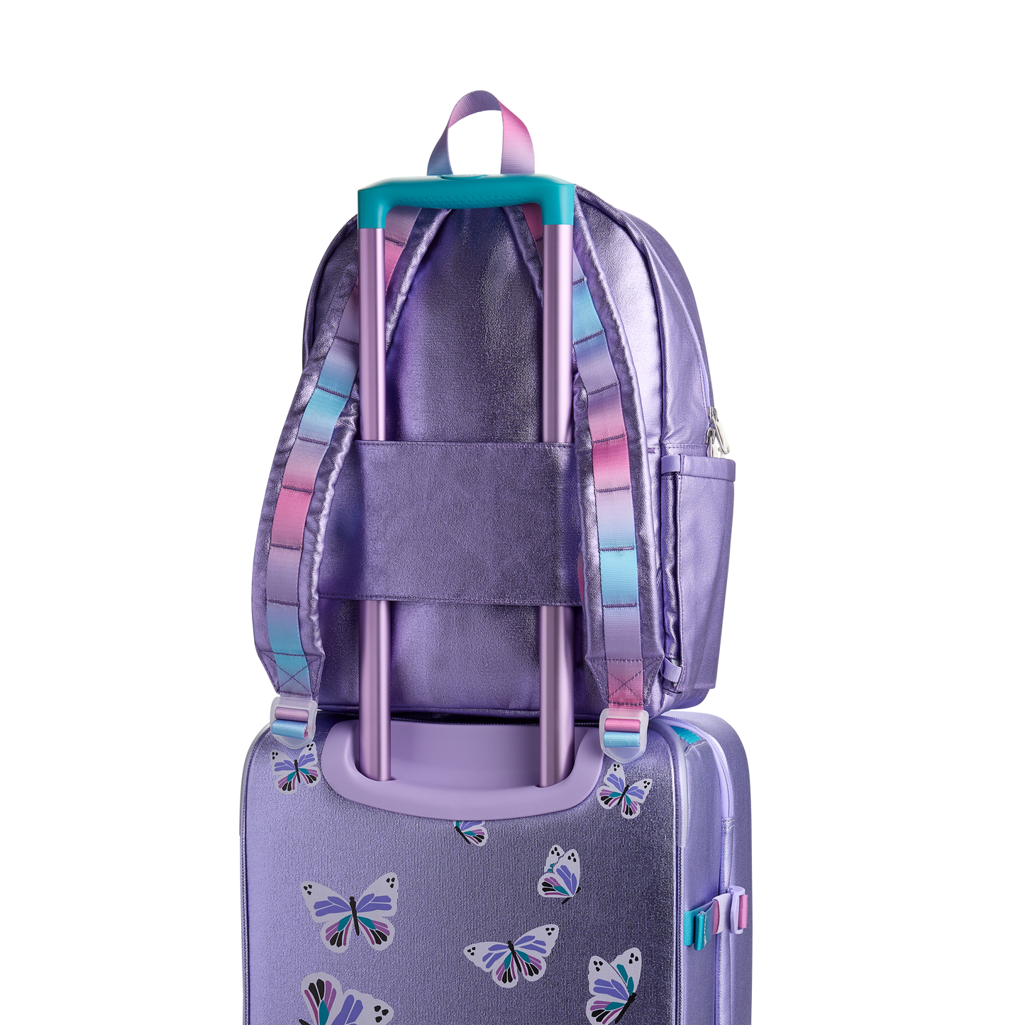 Logan Carry-On Suitcase in Butterfly, styled with child traveler