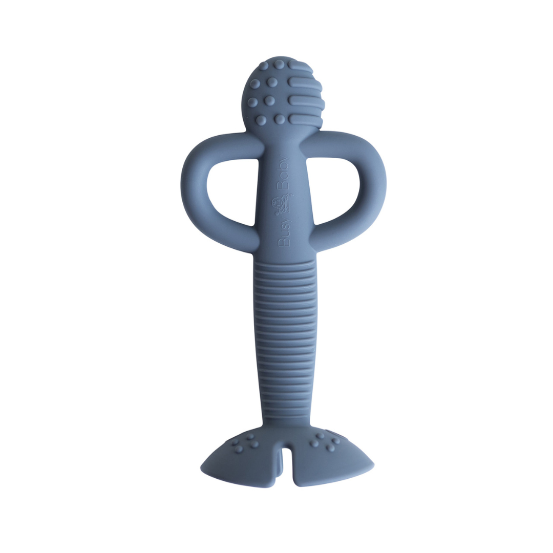 2-in-1 teether and training spoon in pewter color made of food-grade silicone for soothing gums and self-feeding.