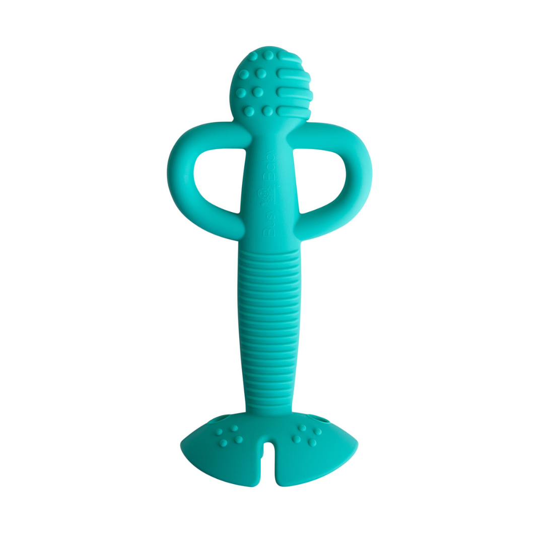 Spearmint 2-in-1 teether and training spoon with textured silicone for soothing gums and self-feeding.