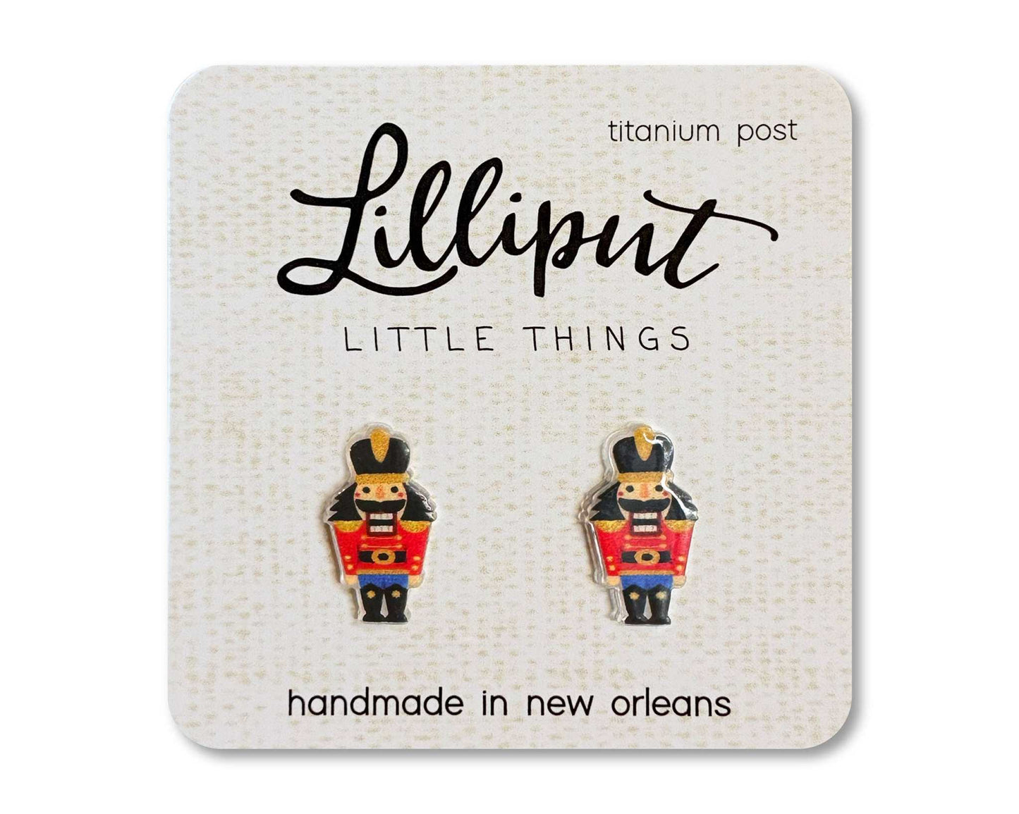 Lilliput Little Things handmade nutcracker stud earrings with hypoallergenic titanium posts on display card