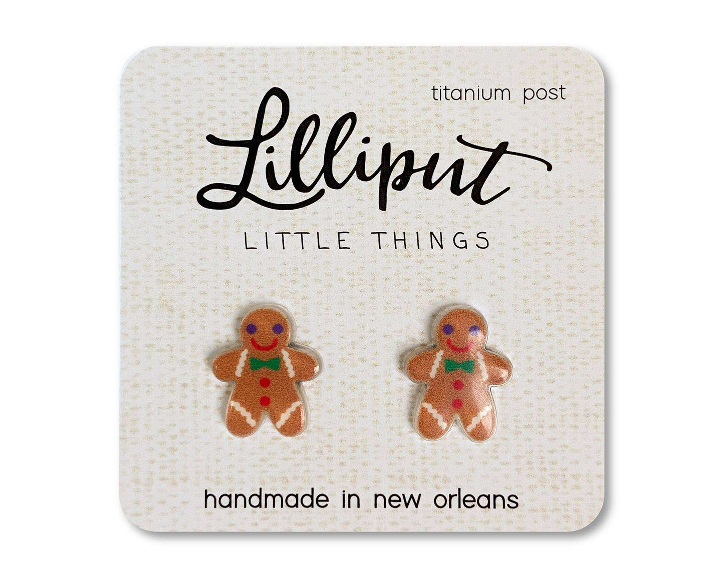 Gingerbread man earrings with hypoallergenic titanium posts, waterproof and fade-proof, handmade Christmas novelty studs by Lilliput Little Things.
