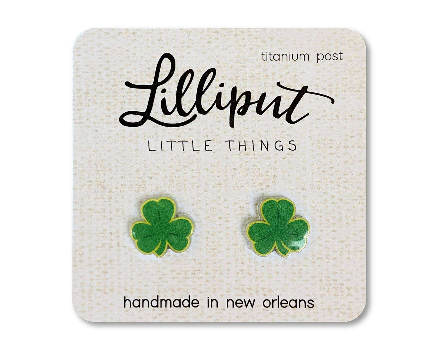 Shamrock earrings on display card, titanium posts, hypoallergenic, handmade in New Orleans.