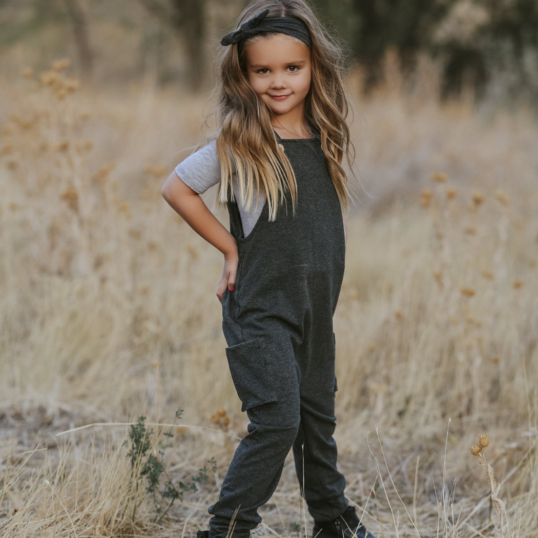 Atlas Heathered Coal Romper with adjustable straps, wooden buttons, 3D pockets.