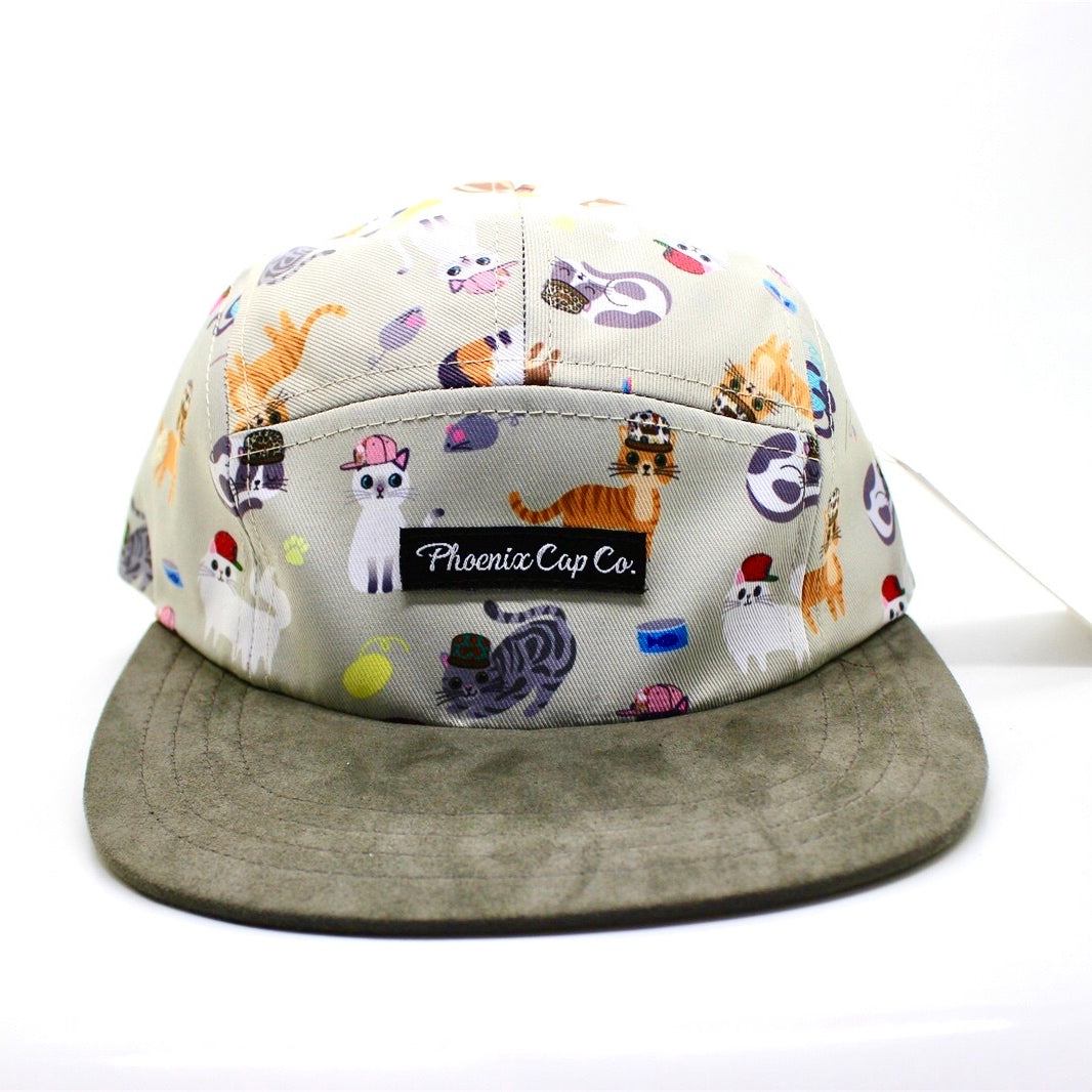 Phoenix Cap Co youth hat with playful kitten print and adjustable snap closure.