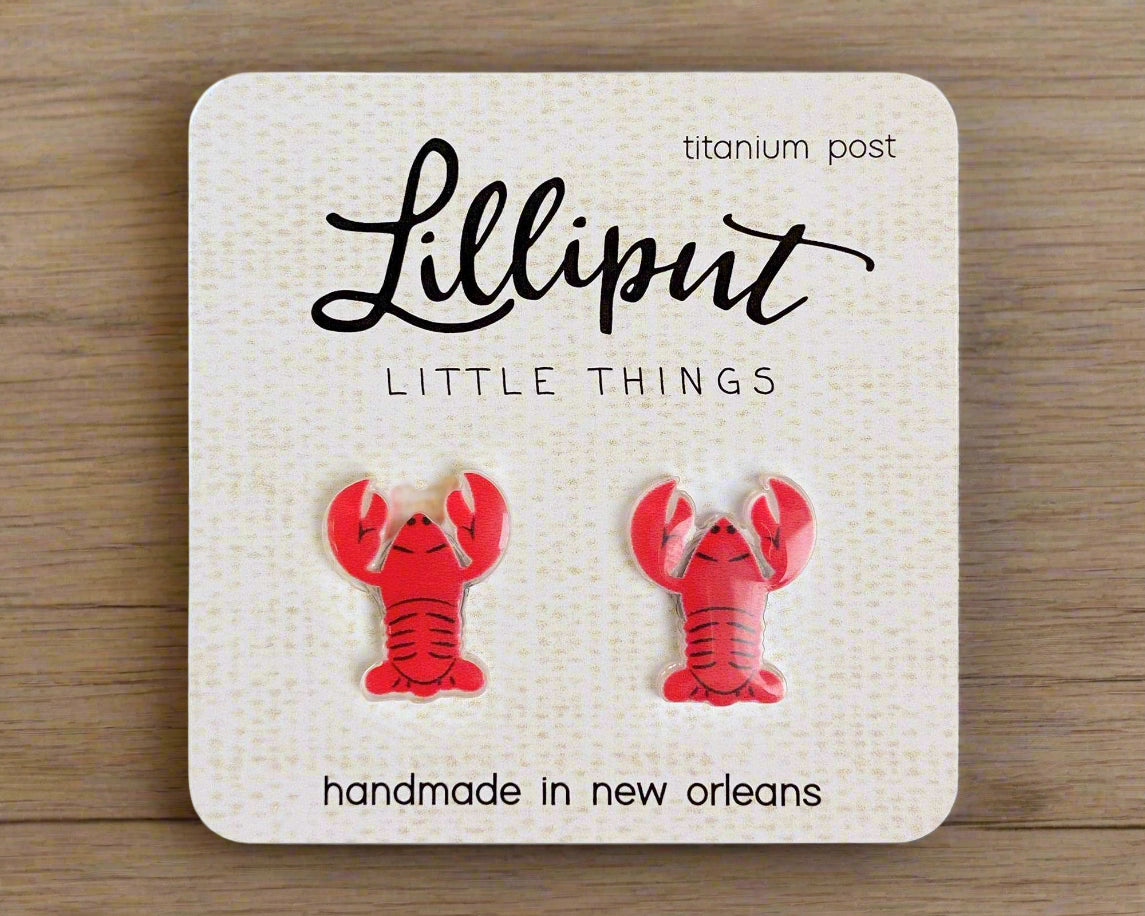 Titanium crawfish earrings with rubber backs, hypoallergenic and handmade in New Orleans.