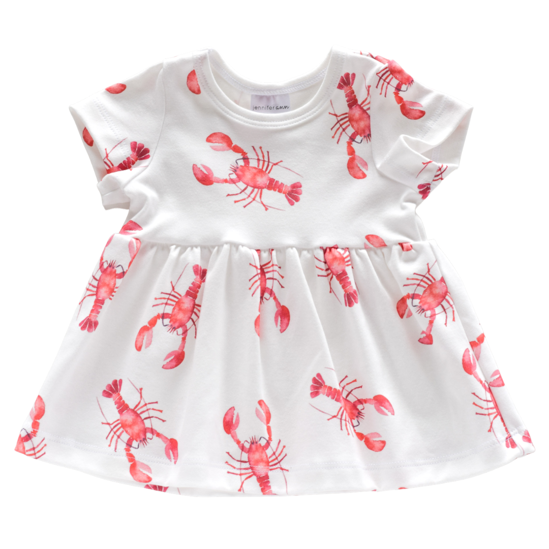 Crawfish Organic Dress for babies, white with red crawfish pattern.