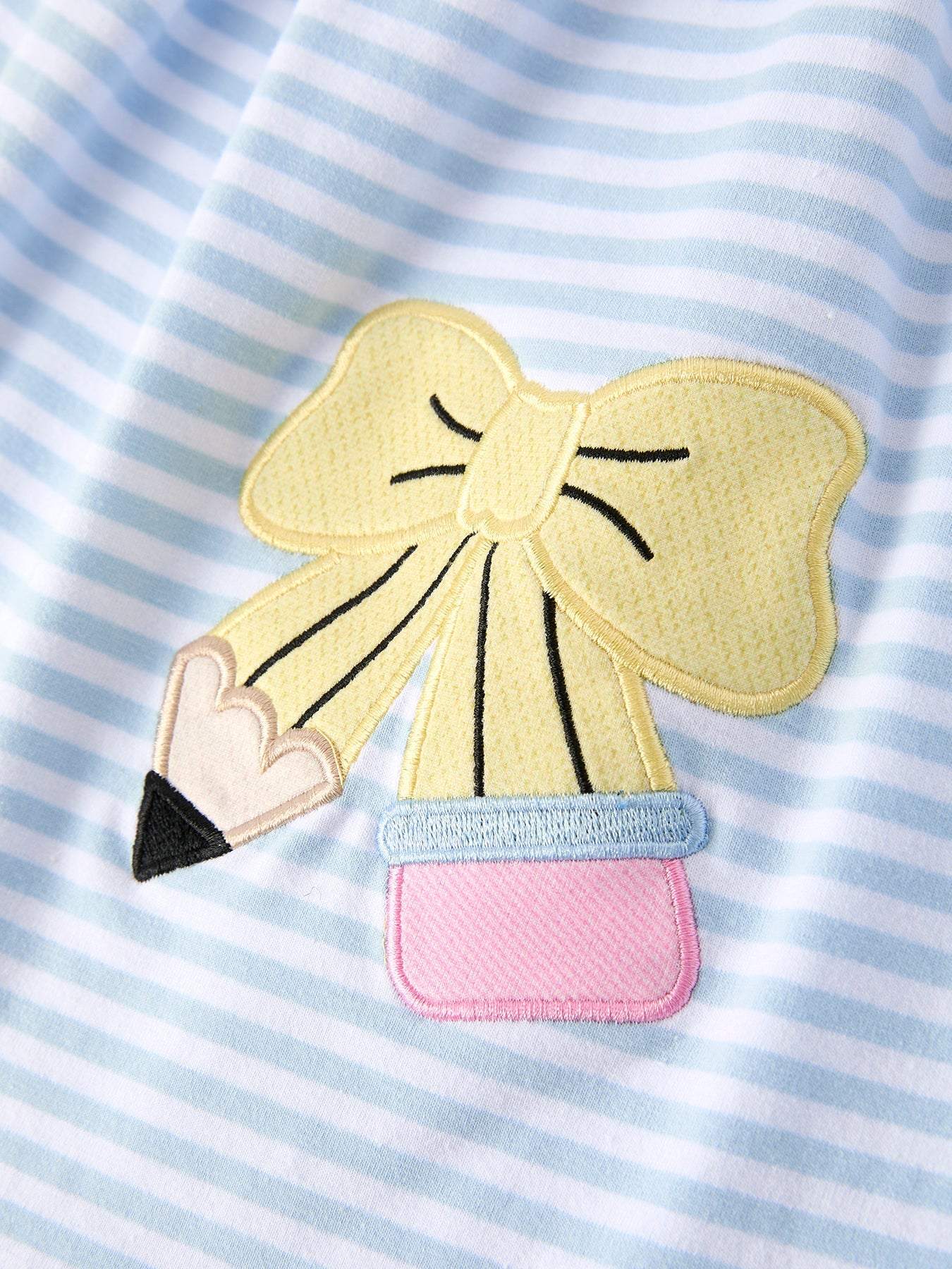 Striped girls school dress styled