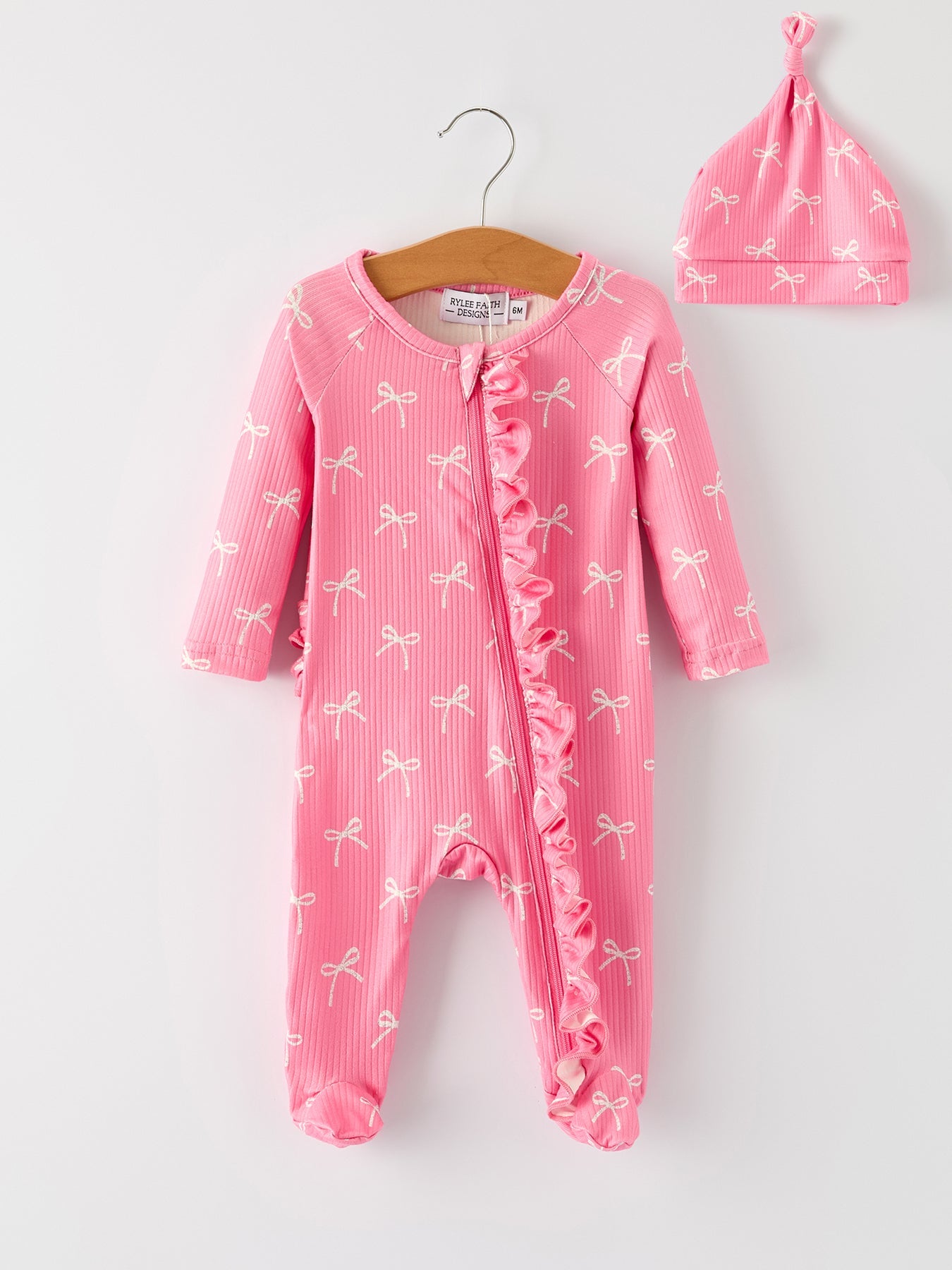 Christmas Bow Pink Romper with Hat: Sweet and Stylish Baby Outfit