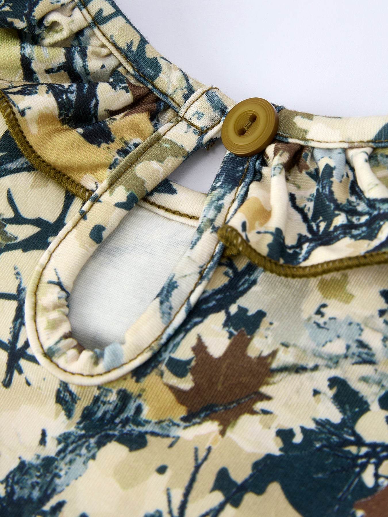 Camo Duck Smocked Bow Ruffle Sleeves Girls Dress fabric and material close-up