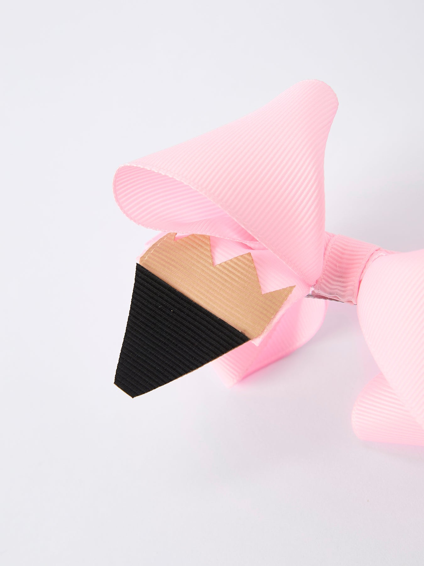 Pencil bow hair clip ribbon stitching detail