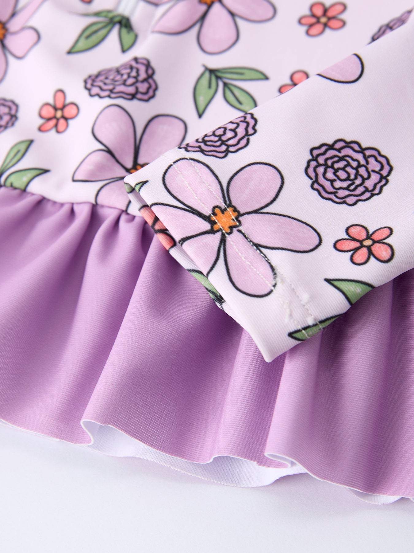 Summer Purple Floral Long Sleeve Girl Swimwear Set swimsuit fabric and material close-up