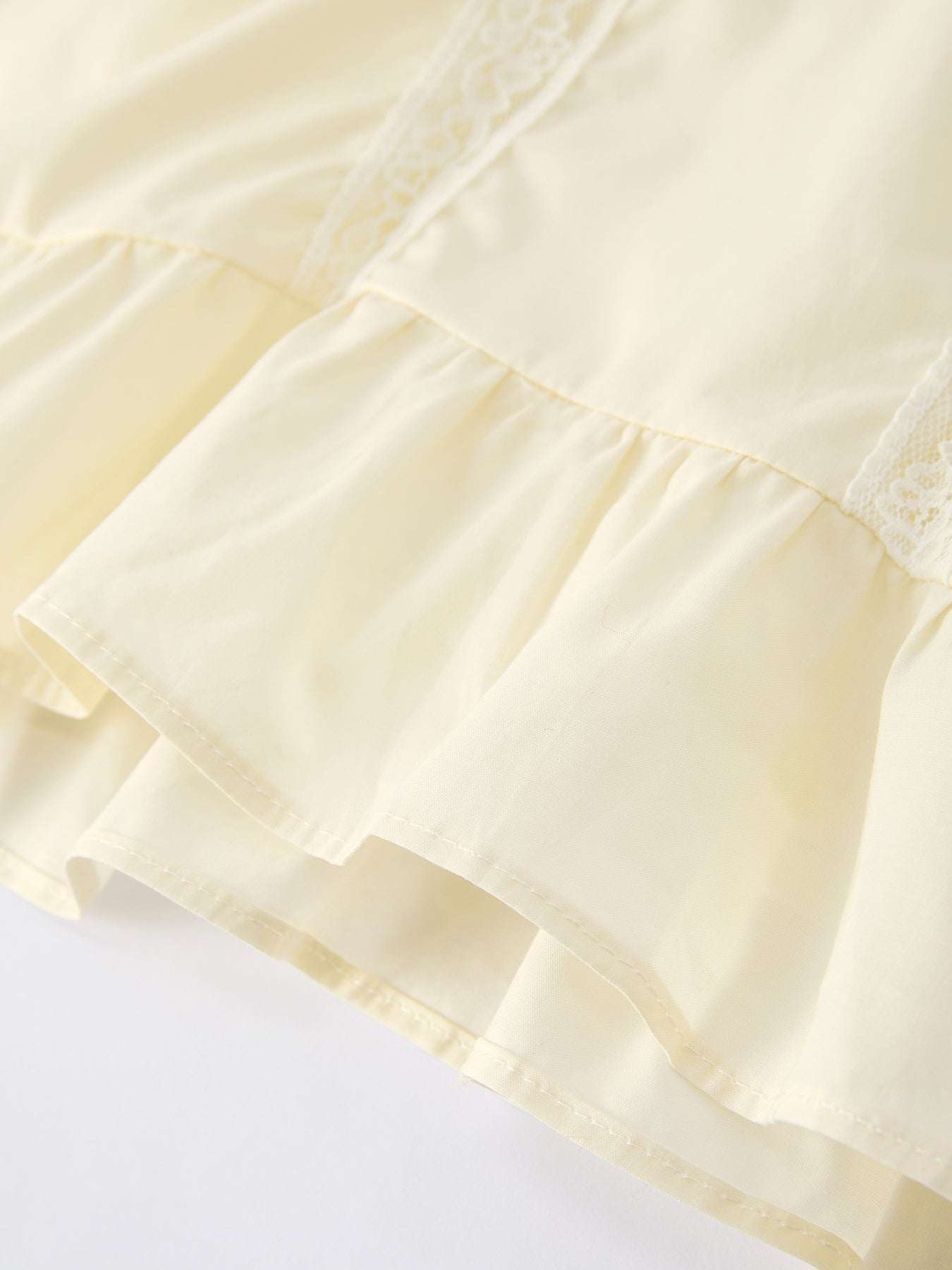 Lace trim detail on girls dress