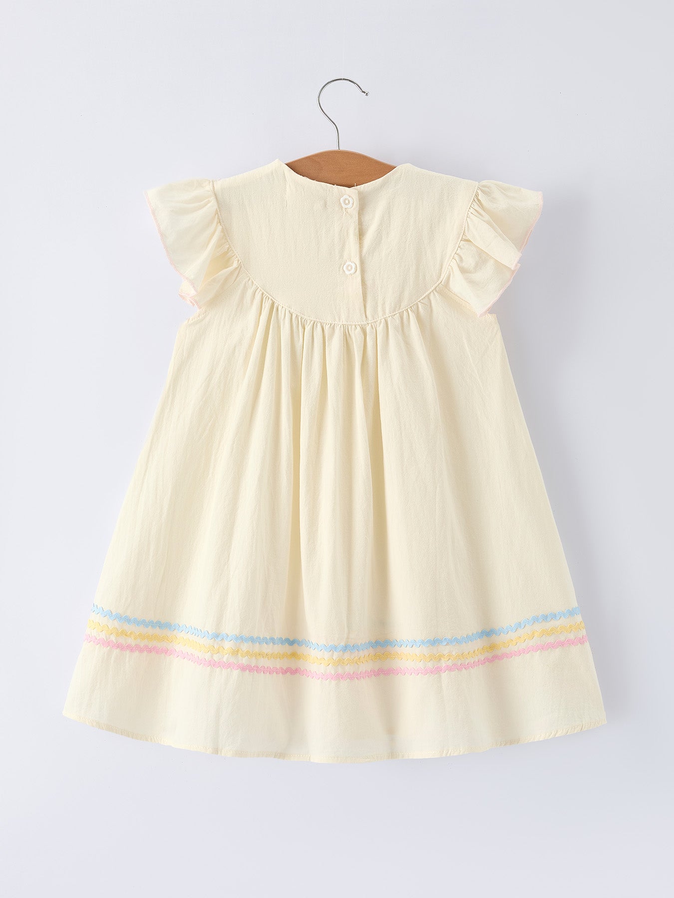 Rainbow sailboat embroidered dress detail view