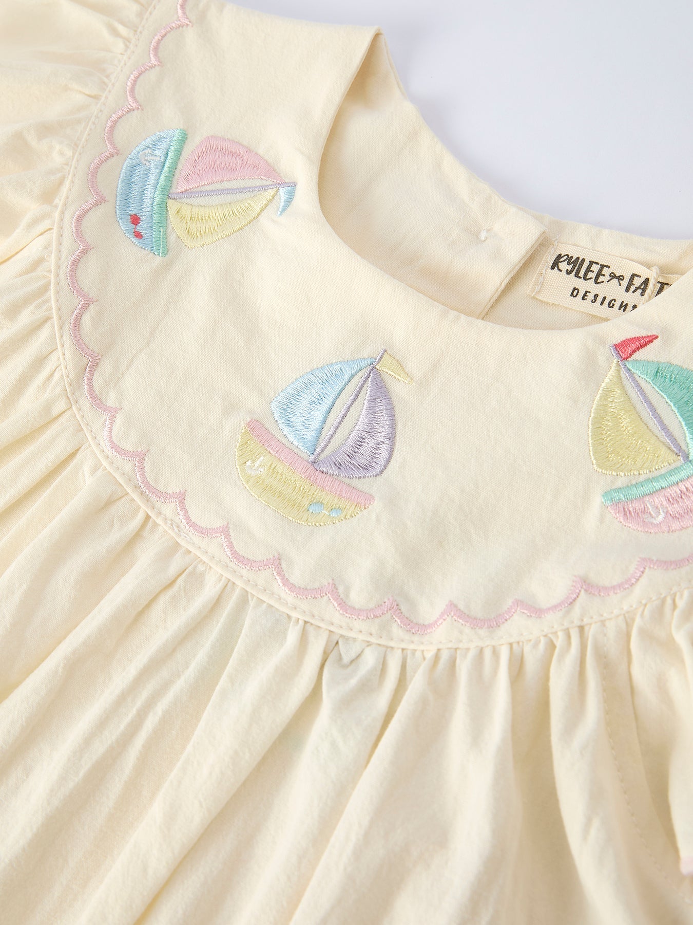 Rainbow sailboat girls dress back view