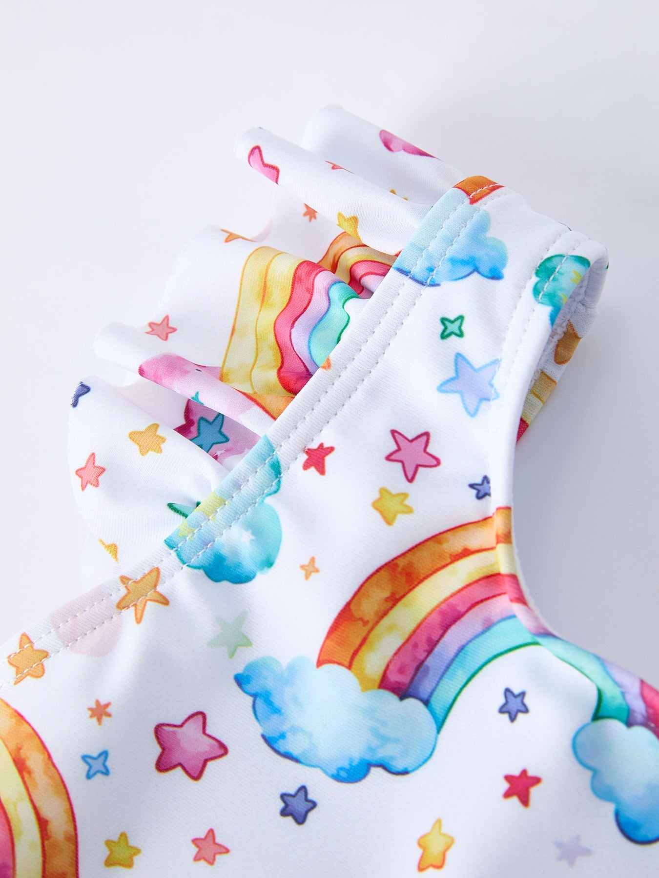 Rainbow print ruffle swim set side view