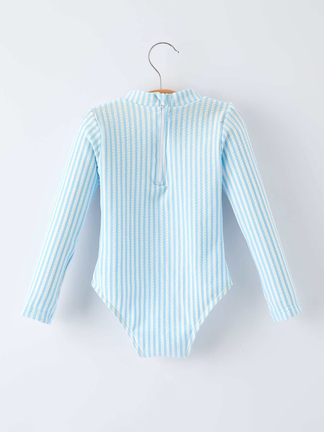 Rainbow baby girls swimsuit detail view