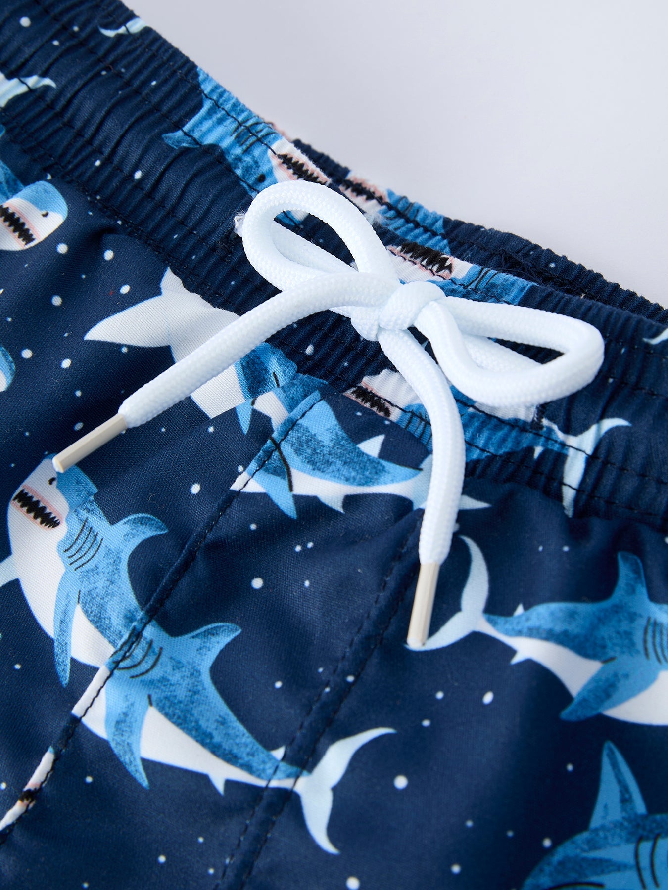 Shark swimsuit print close-up