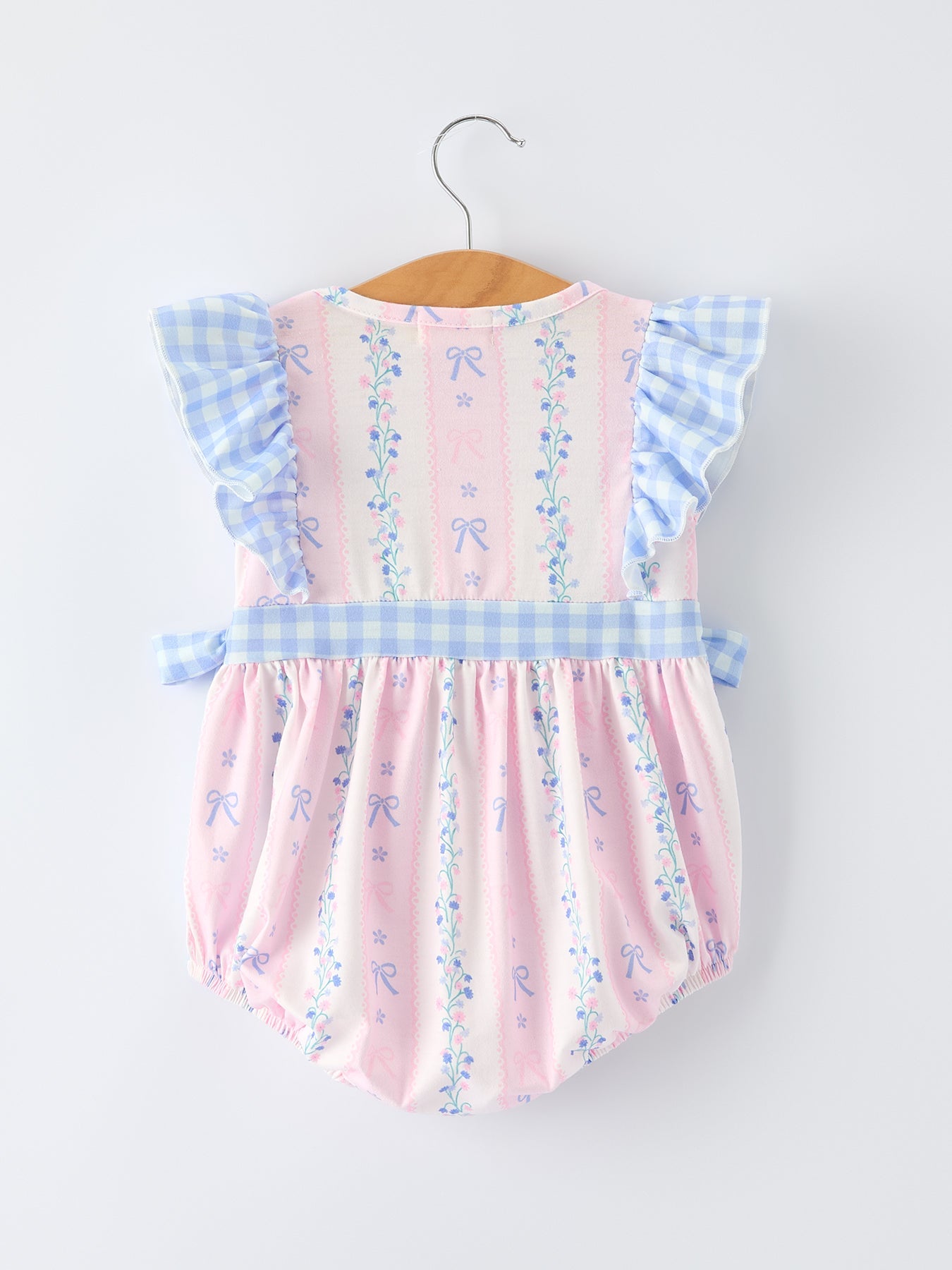 Smocking detail on Daddy's Girl plaid baby romper