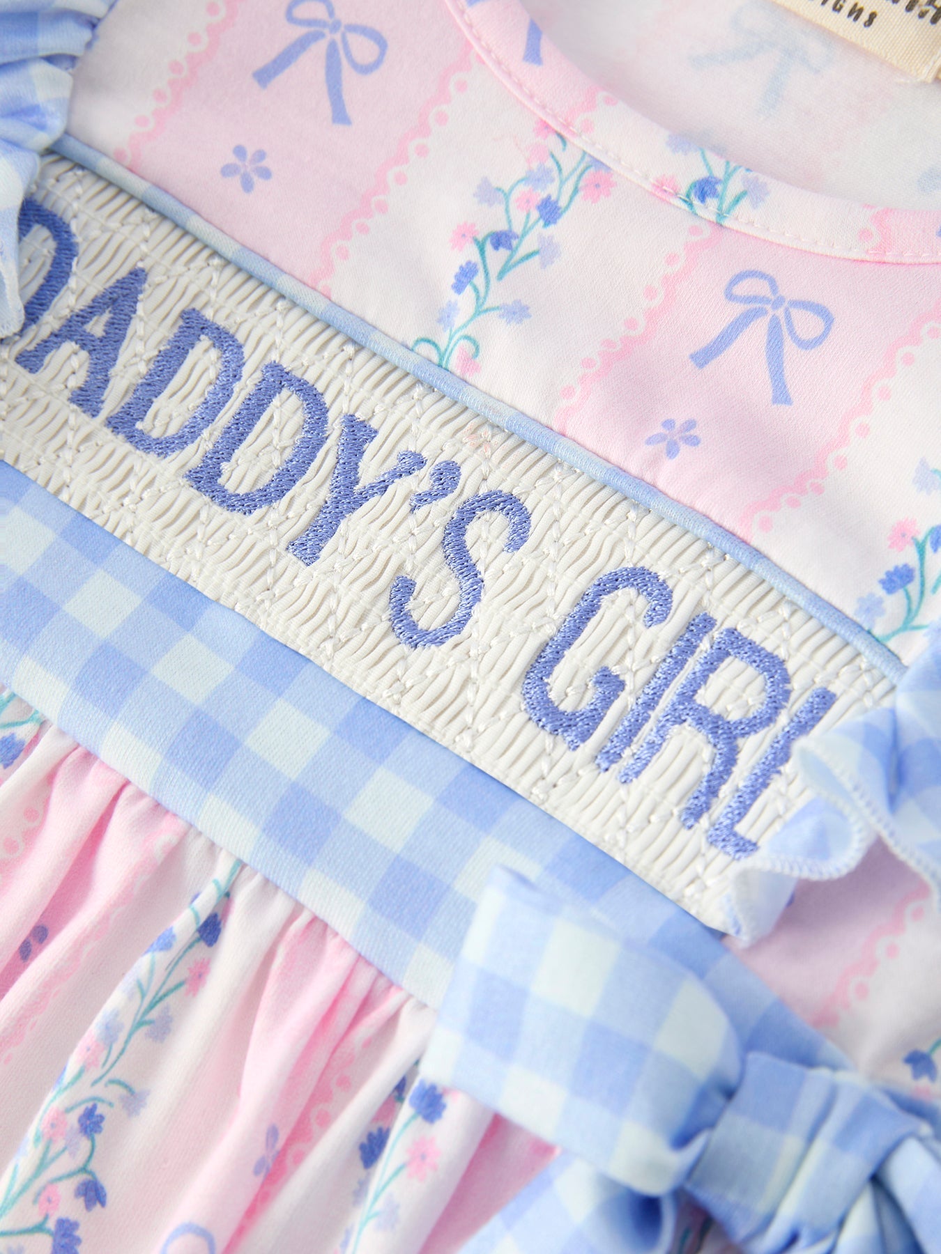 Daddy's Girl plaid baby romper styled for newborn photos