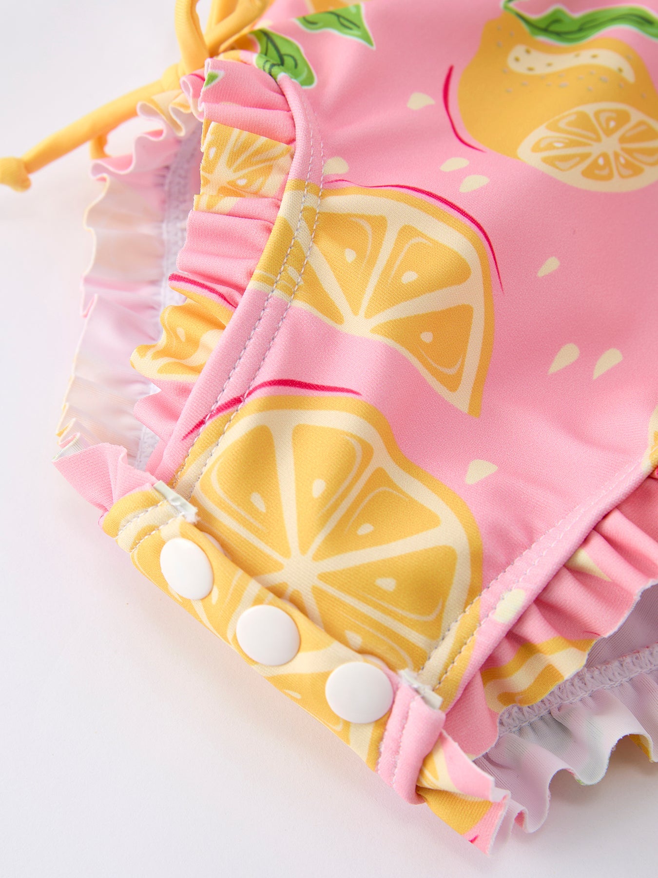 Lemon print girl swimsuit back view
