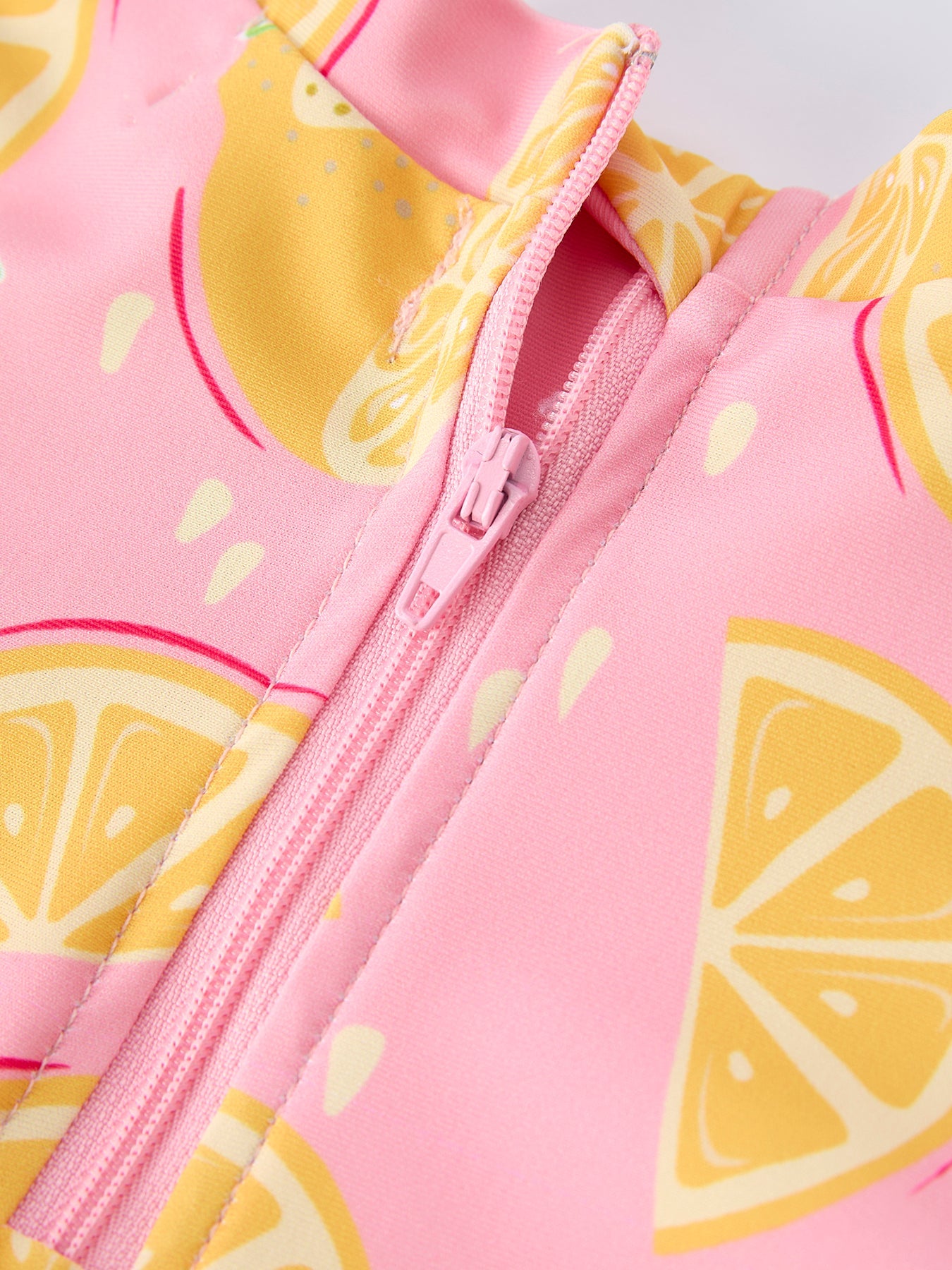 Lemon print ruffle swimsuit side view