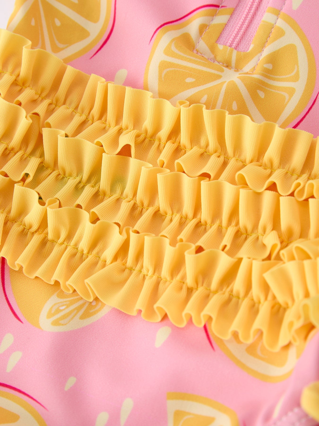 Lemon print swimsuit fabric close-up
