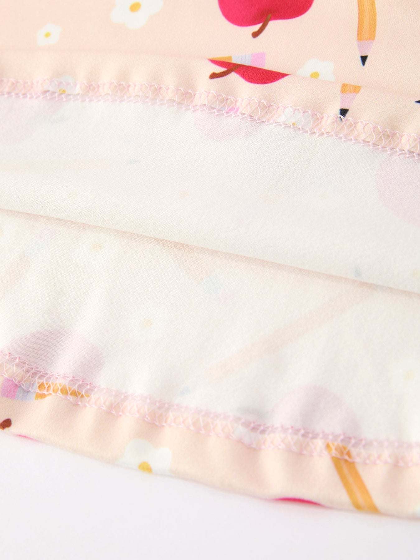 Girls Back To School Apple Pencil Twirl Dress - fabric and material close-up