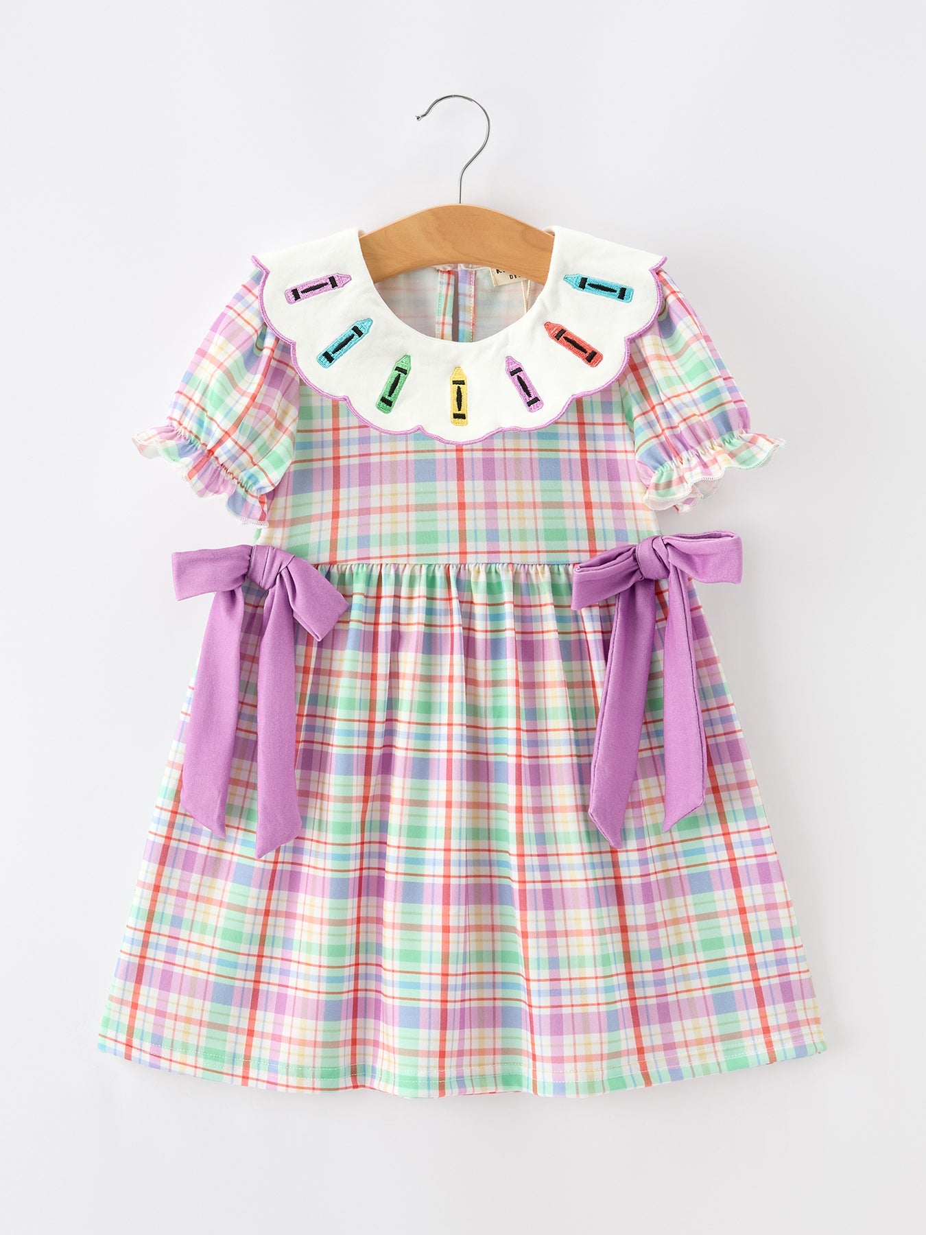 Back to school plaid crayon embroidery girls dress with puff sleeves front view
