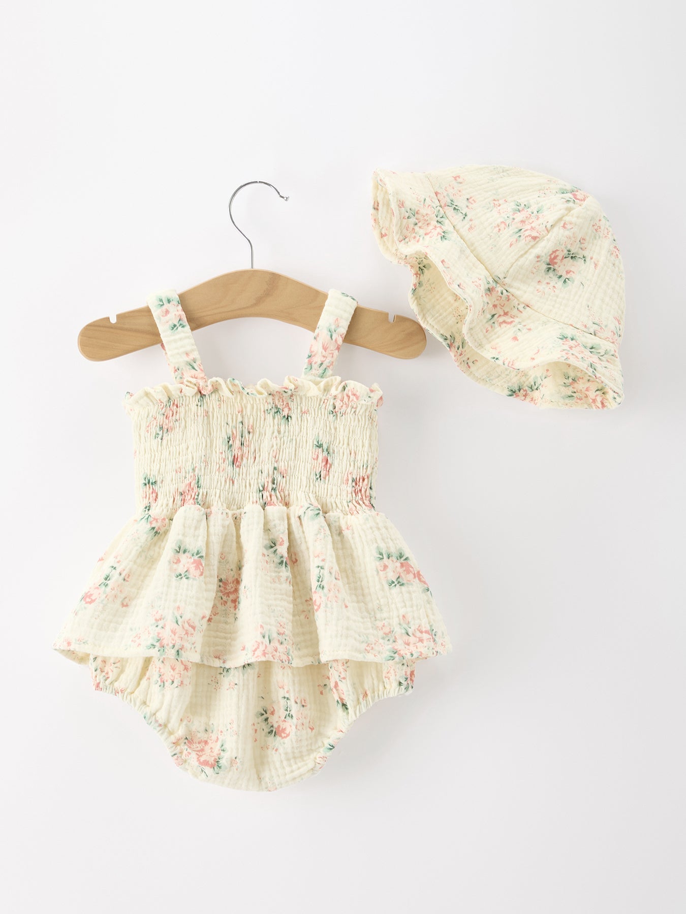 Summer floral smocked baby girl romper detail view