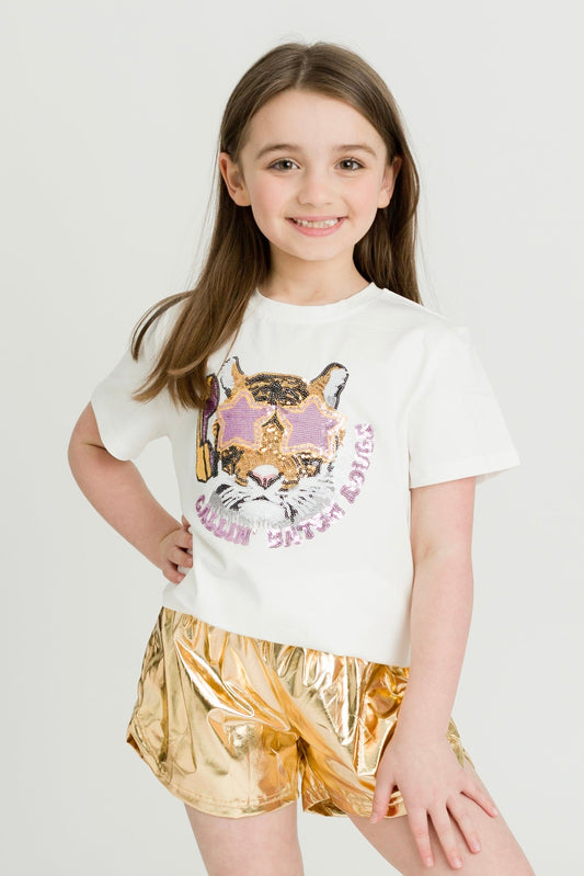 Child wearing Callin' Baton Rouge shirt with sequin tiger and gold shorts