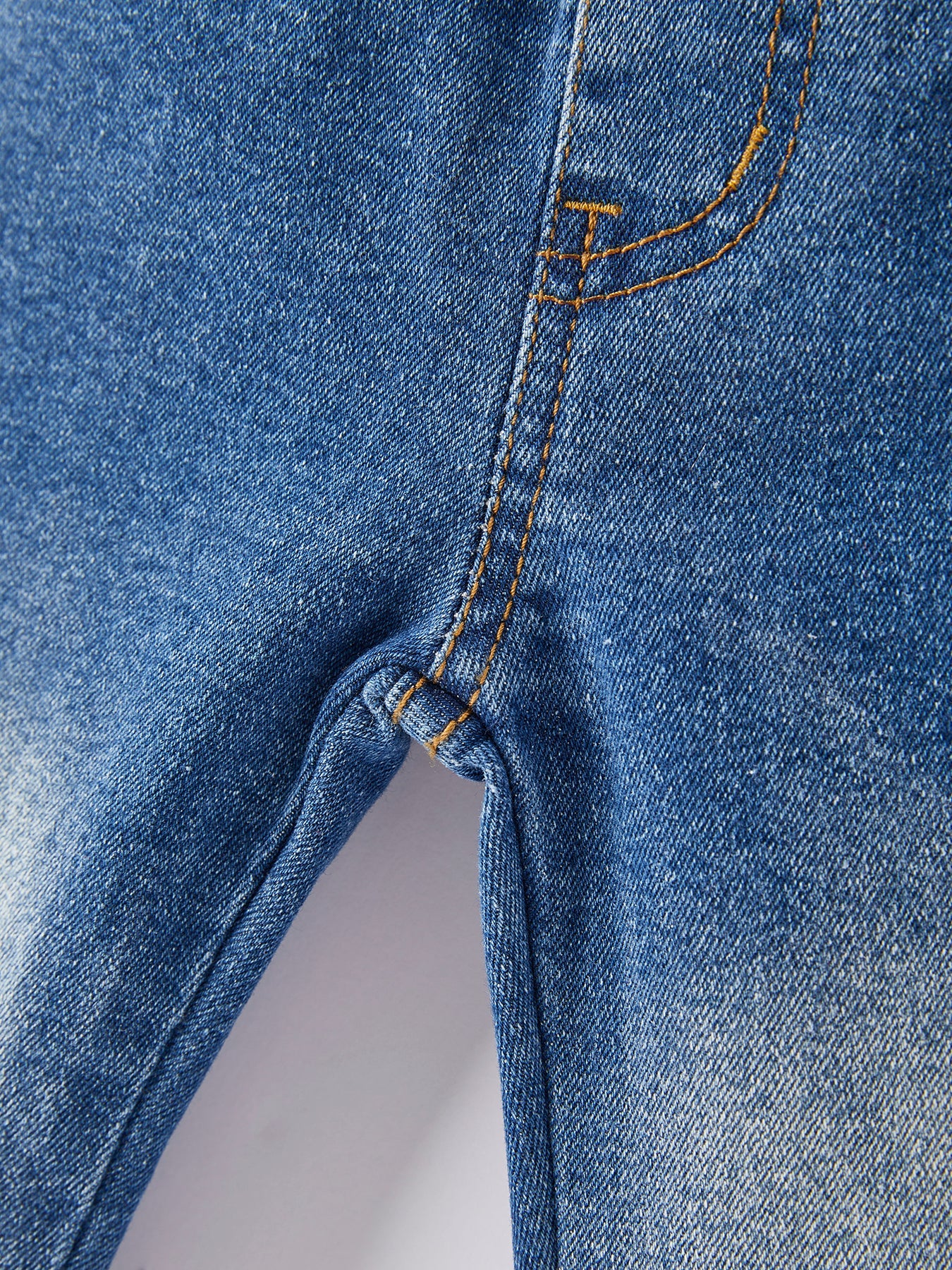 Girls blue denim bell jeans back view