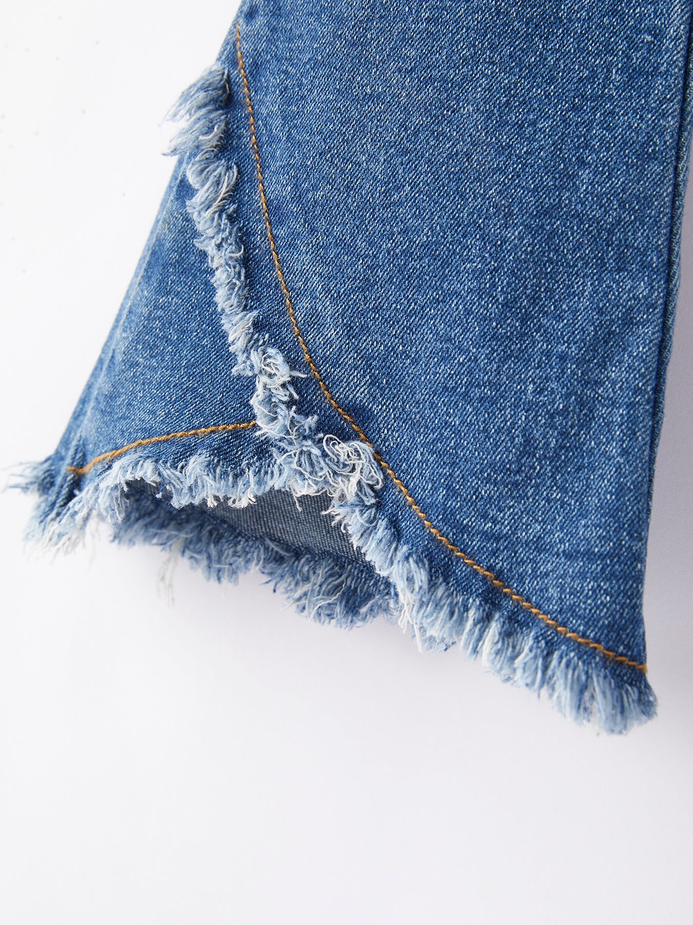 Girls blue denim bell pants side view