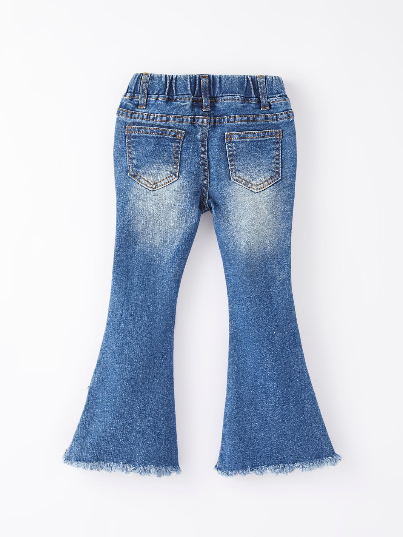 Girls blue denim bell jeans fabric close-up