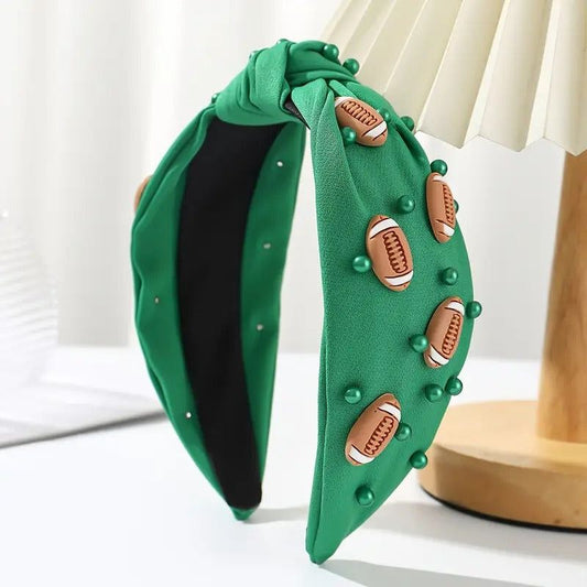 Sporty knotted headband in green with football decorations and bead accents