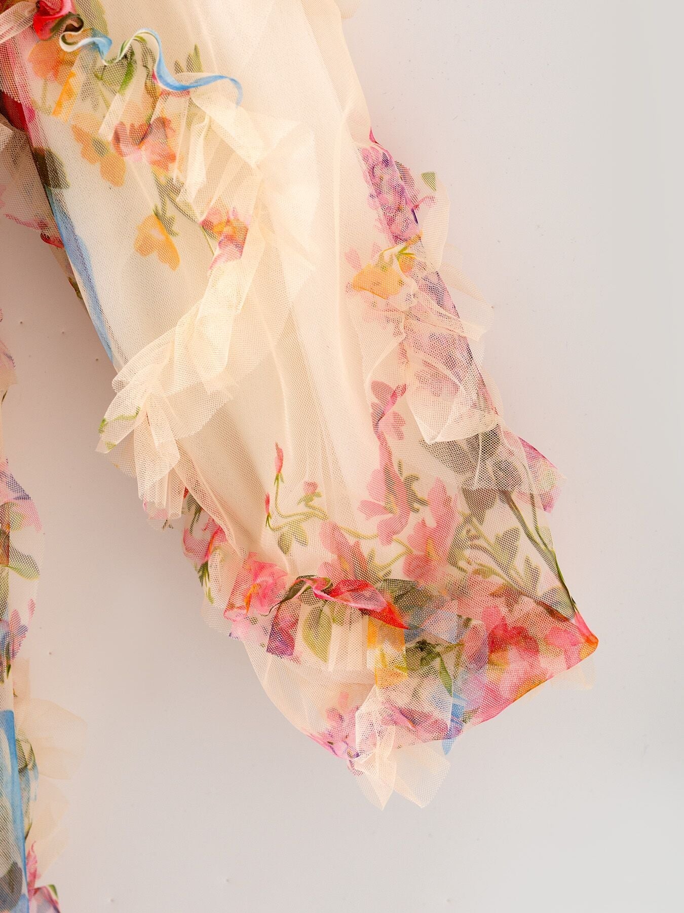 Pastel flower ruffle dress side view