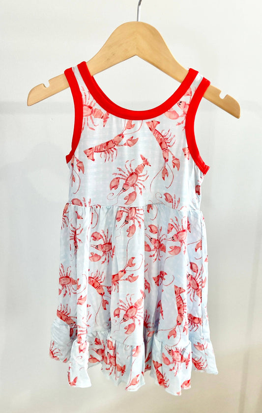 Sweet Bay Clothing - Crawfish Racerback Twirl Dress with watercolor design on hanger.