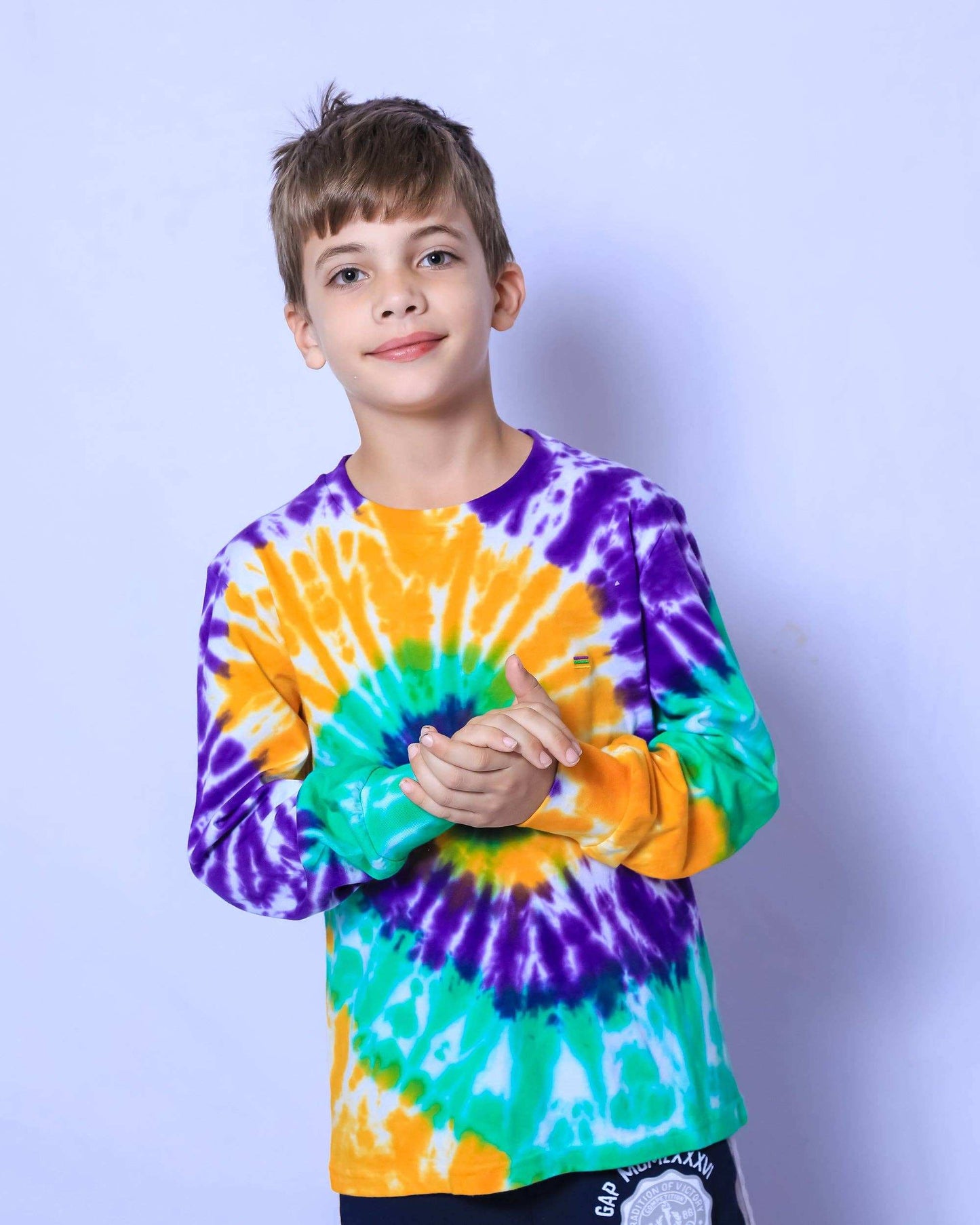 Mardi Gras Creations - Tie Dye Swirl Youth Long Sleeve for kids in purple, green, and gold.